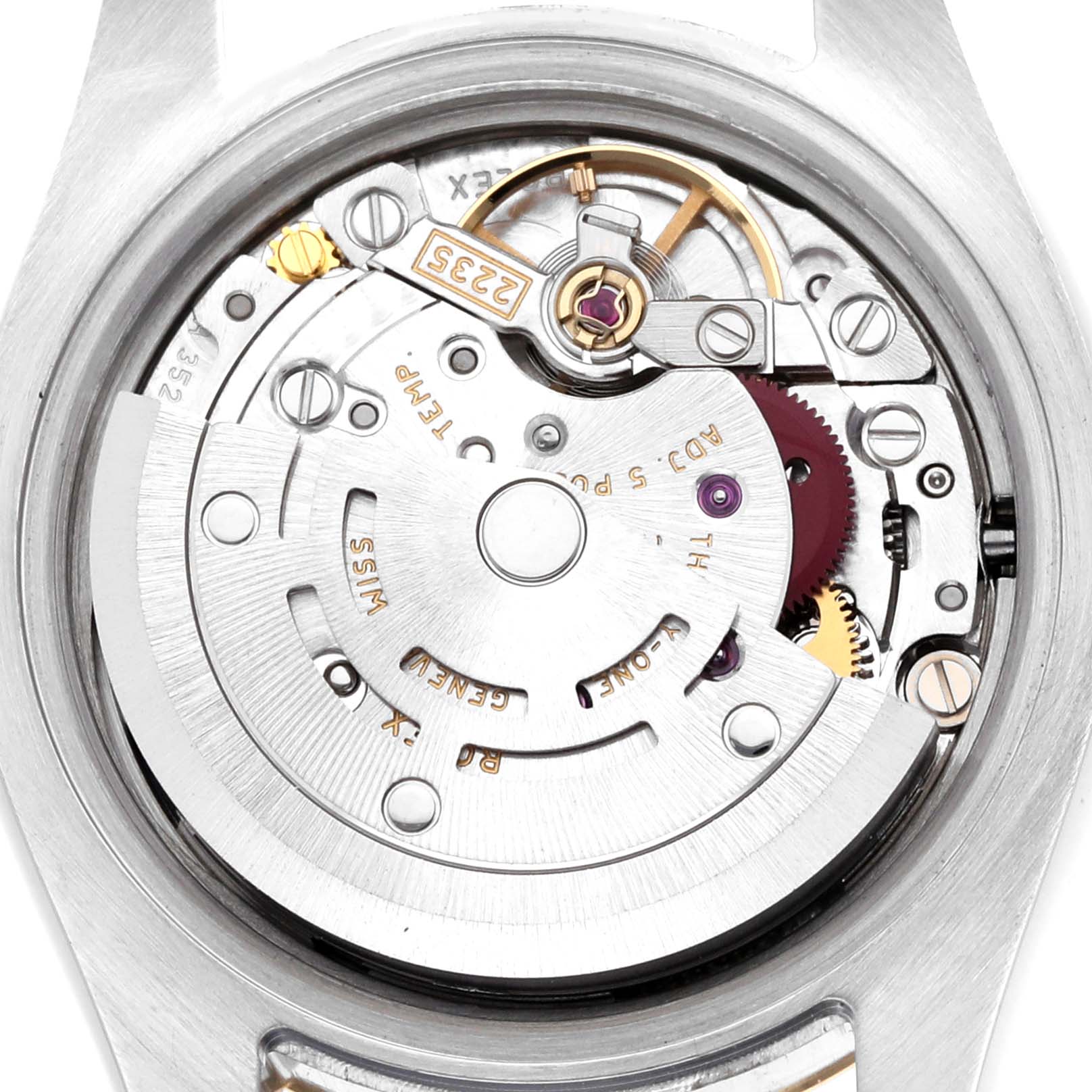 The image shows the movement of a Rolex Datejust 179173 Women's Steel and Gold (two tone) Black Dial watch, focusing on its intricate mechanical components from a top-down angle.