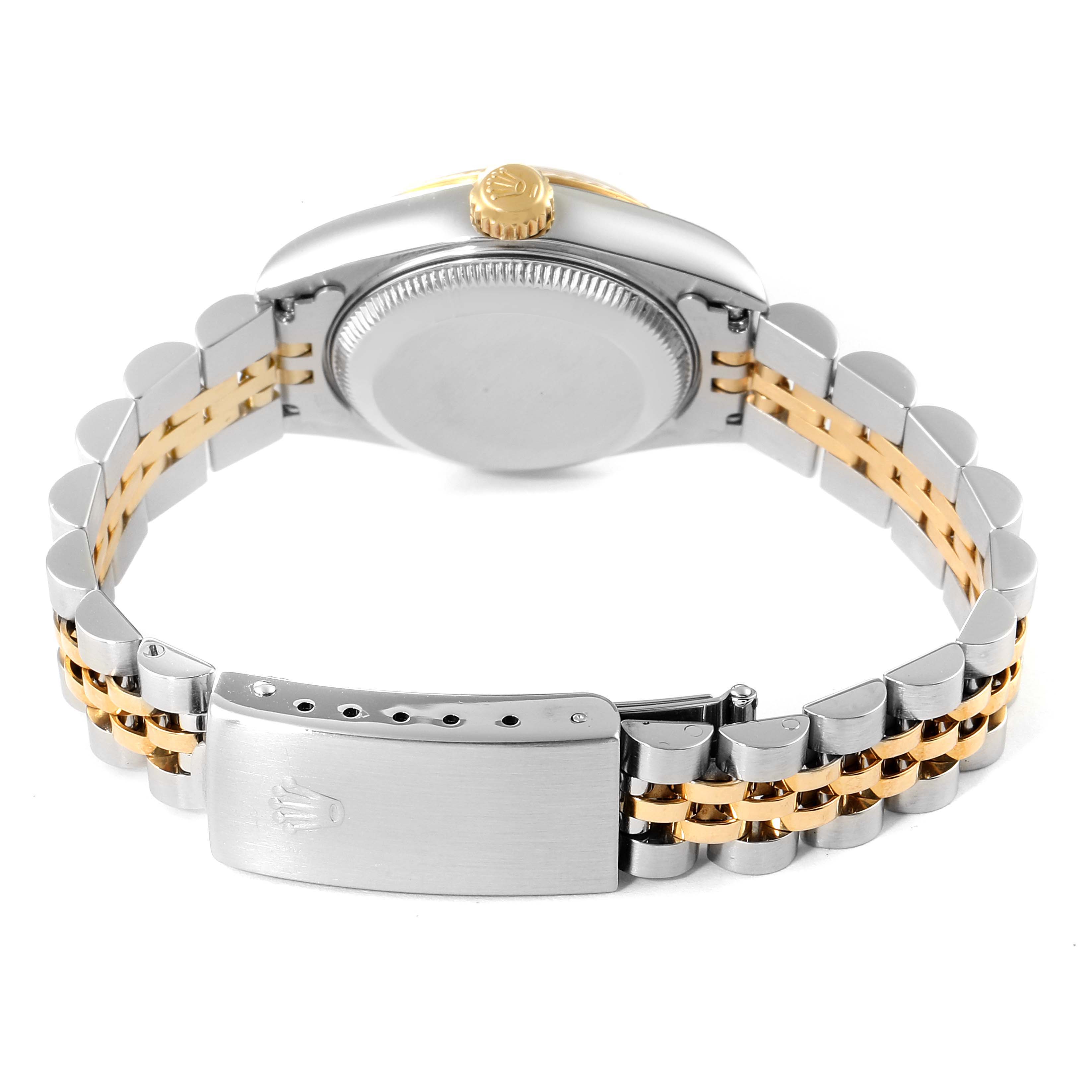 This image shows the backside and bracelet of a Rolex Datejust 79173 Women
s Steel and Gold (two tone) Black Dial 79173 Women
s Steel and Gold (two tone) Black Dial watch, featuring a two-tone metal design and clasp.