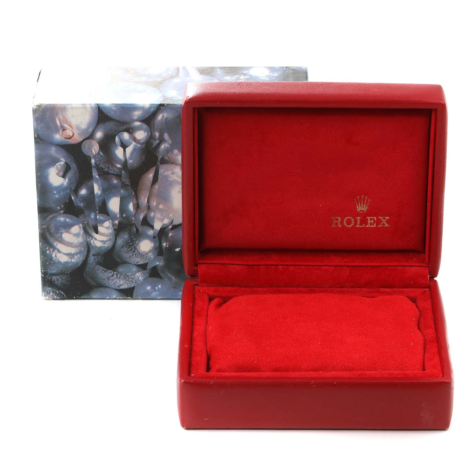 The image shows an open red Rolex box for the Datejust model, with the brand logo on the interior lid and an outer decorative box.