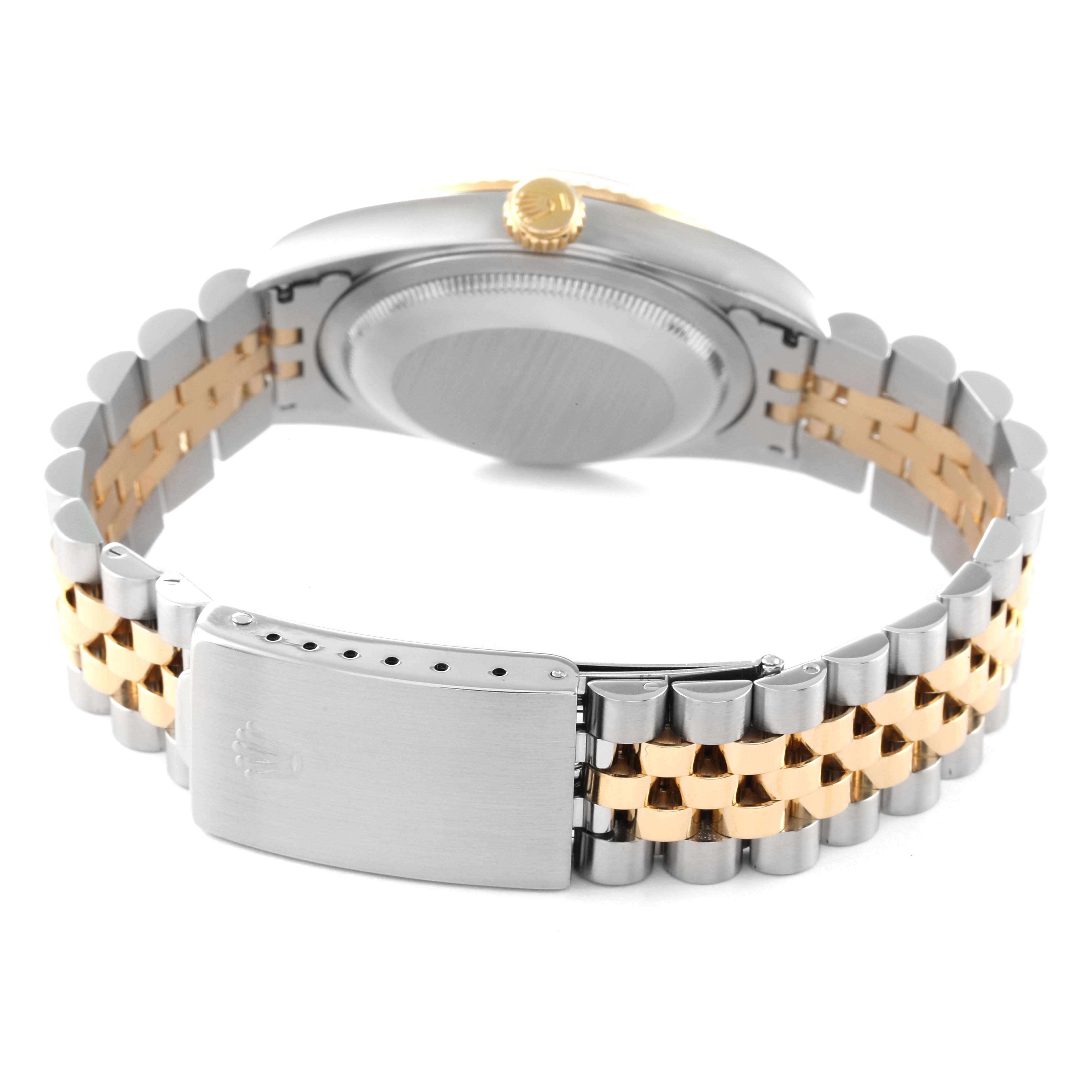 The image shows the back and bracelet of a Rolex Datejust 16233 Men's Steel and Gold (two tone) Champagne Dial 16233 Men's Steel and Gold (two tone) Champagne Dial watch, with a mix of stainless steel and gold links.