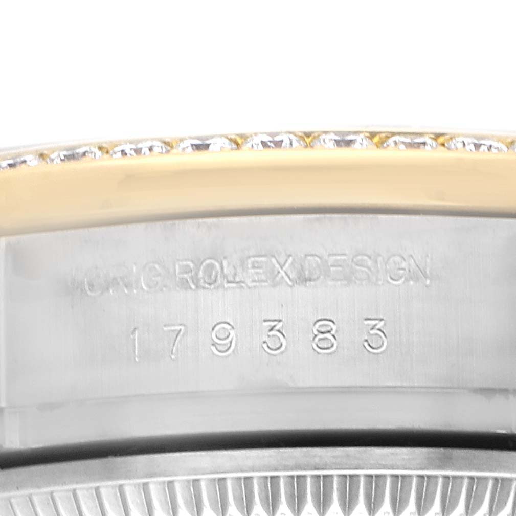 The image shows the side of a Rolex Datejust 179383 Women's Steel and Gold (two tone) Silver Dial watch case with engraving visible.