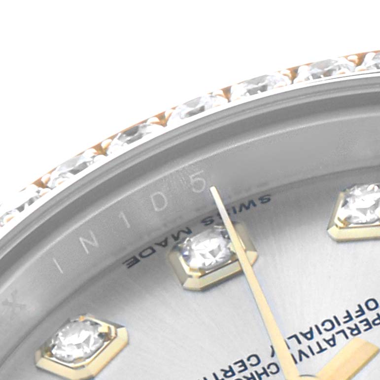 The image shows a partial view of a Rolex Datejust 179383 Women's Steel and Gold (two tone) Silver Dial watch, focusing on the bezel, dial, and diamond hour markers.