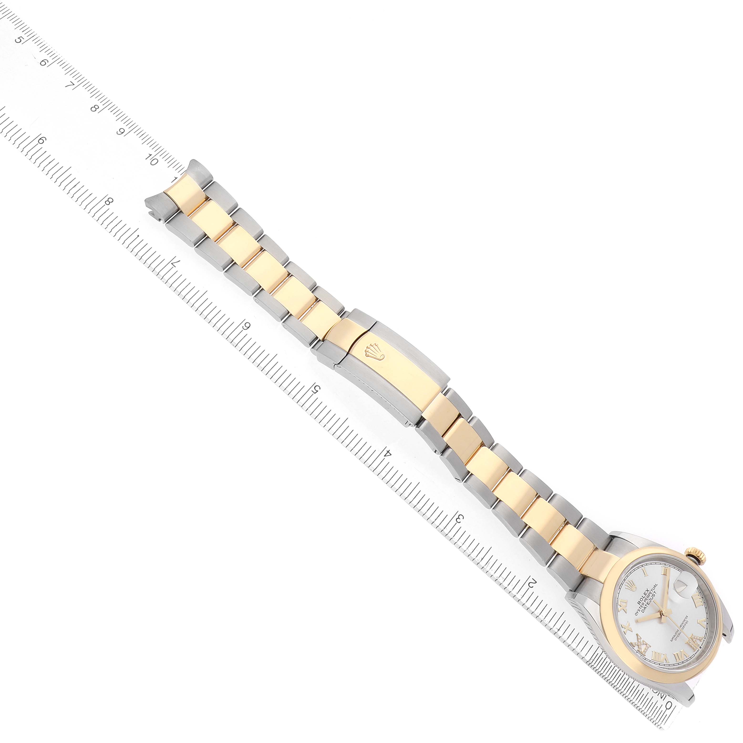 The Rolex Datejust 126203 Men
s Steel and Gold (two tone) Silver Dial watch is shown from a top view, displaying the dial, bezel, and bi-metal bracelet.