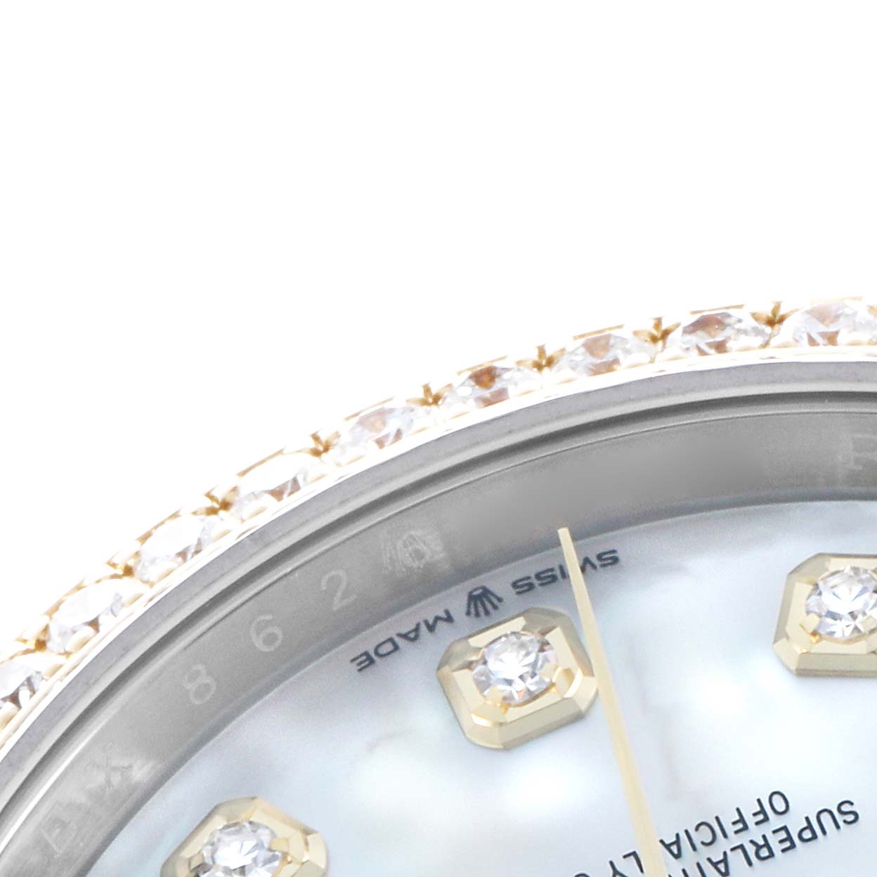 The image shows a close-up of the Rolex Datejust 126283 Men's Steel and Gold (two tone) Mother of Pearl Dial's bezel with diamonds and part of the dial with diamond markers.