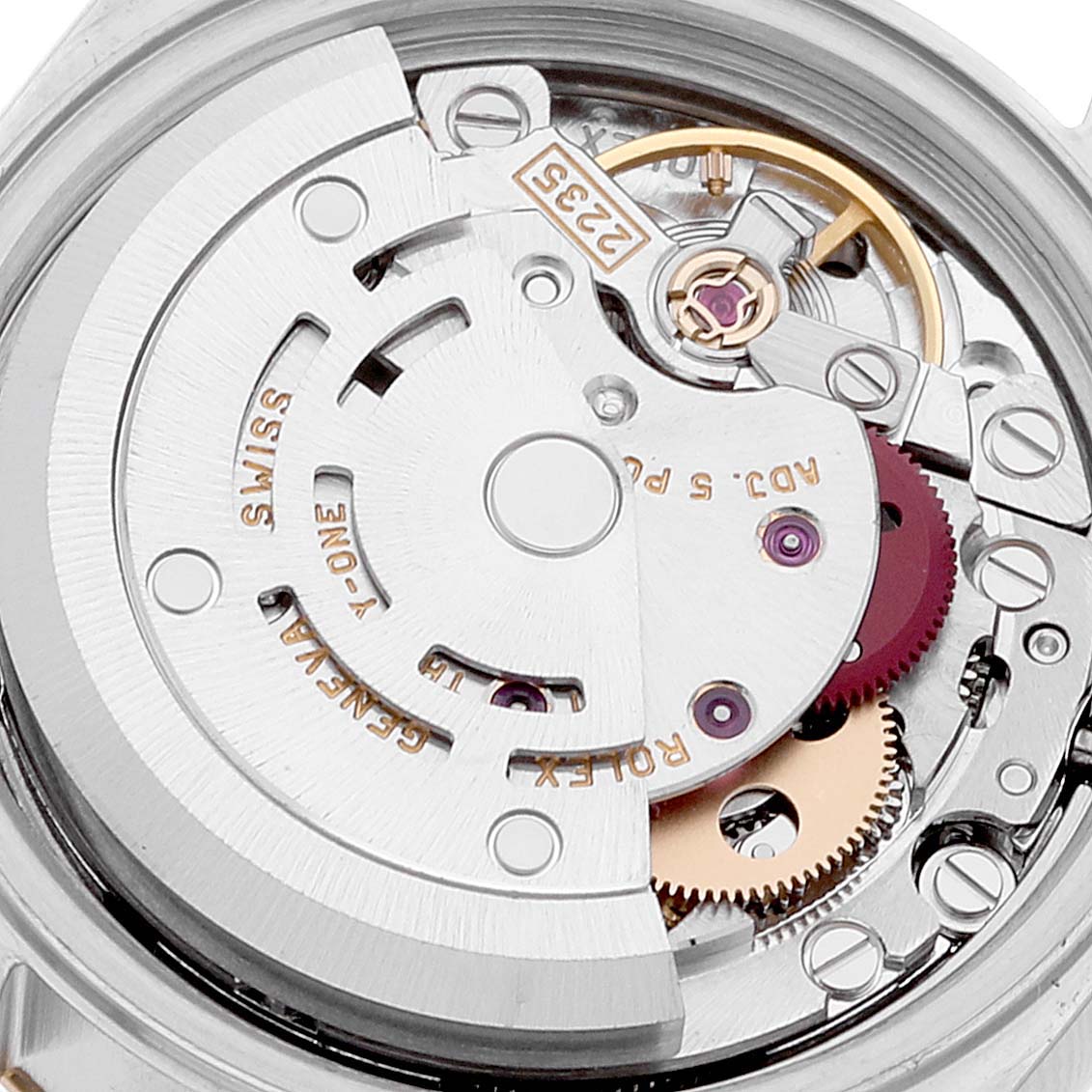 This image shows the inner mechanics of a Rolex Datejust 79173 Women's Steel and Gold (two tone) Beige Dial 79173 Women's Steel and Gold (two tone) Beige Dial watch, focusing on the movement and gears.