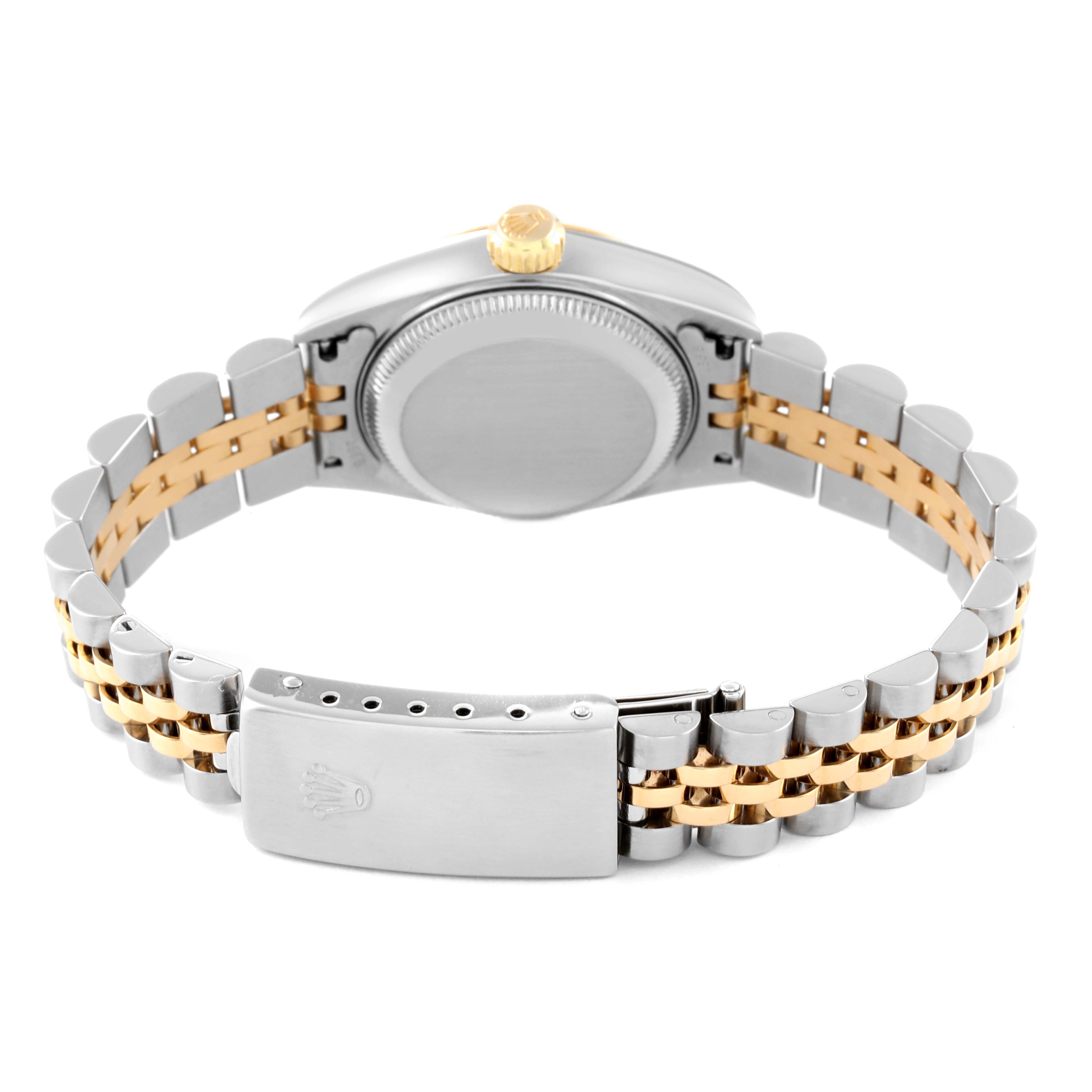 This image shows the back view of a Rolex Datejust 79173 Women's Steel and Gold (two tone) Beige Dial 79173 Women's Steel and Gold (two tone) Beige Dial watch, highlighting the case, crown, and two-tone bracelet with a clasp.