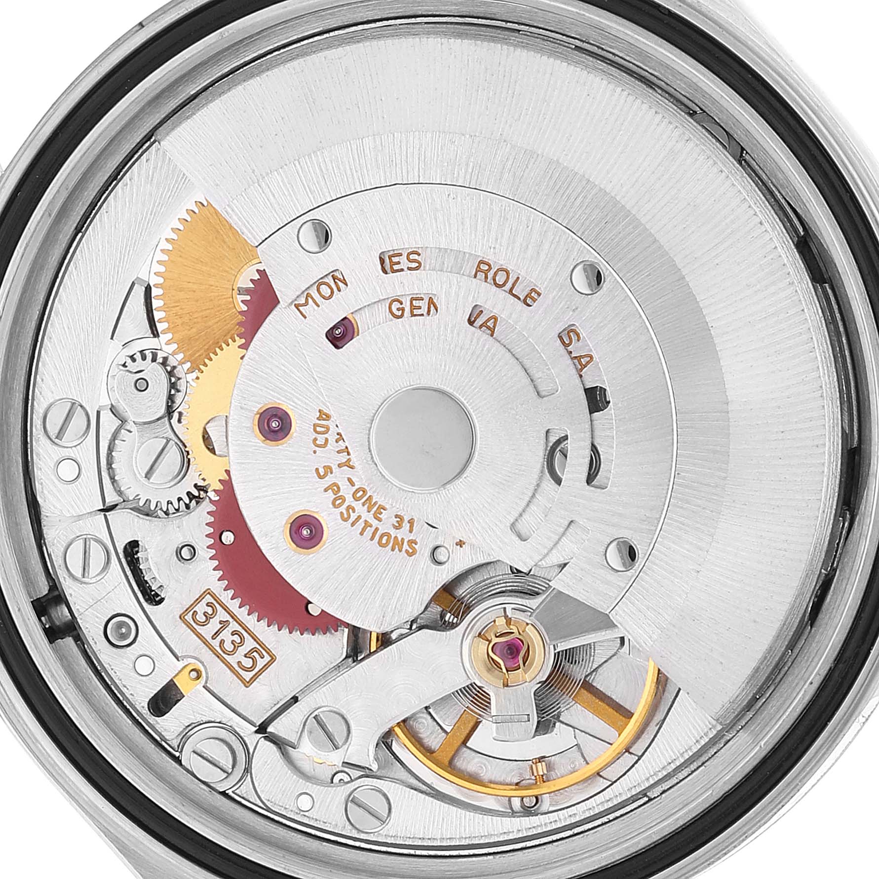 This image shows an inside view of the Rolex Datejust 16233 Men's Steel and Gold (two tone) White Dial 16233 Men's Steel and Gold (two tone) White Dial watch, highlighting its intricate mechanical movement.