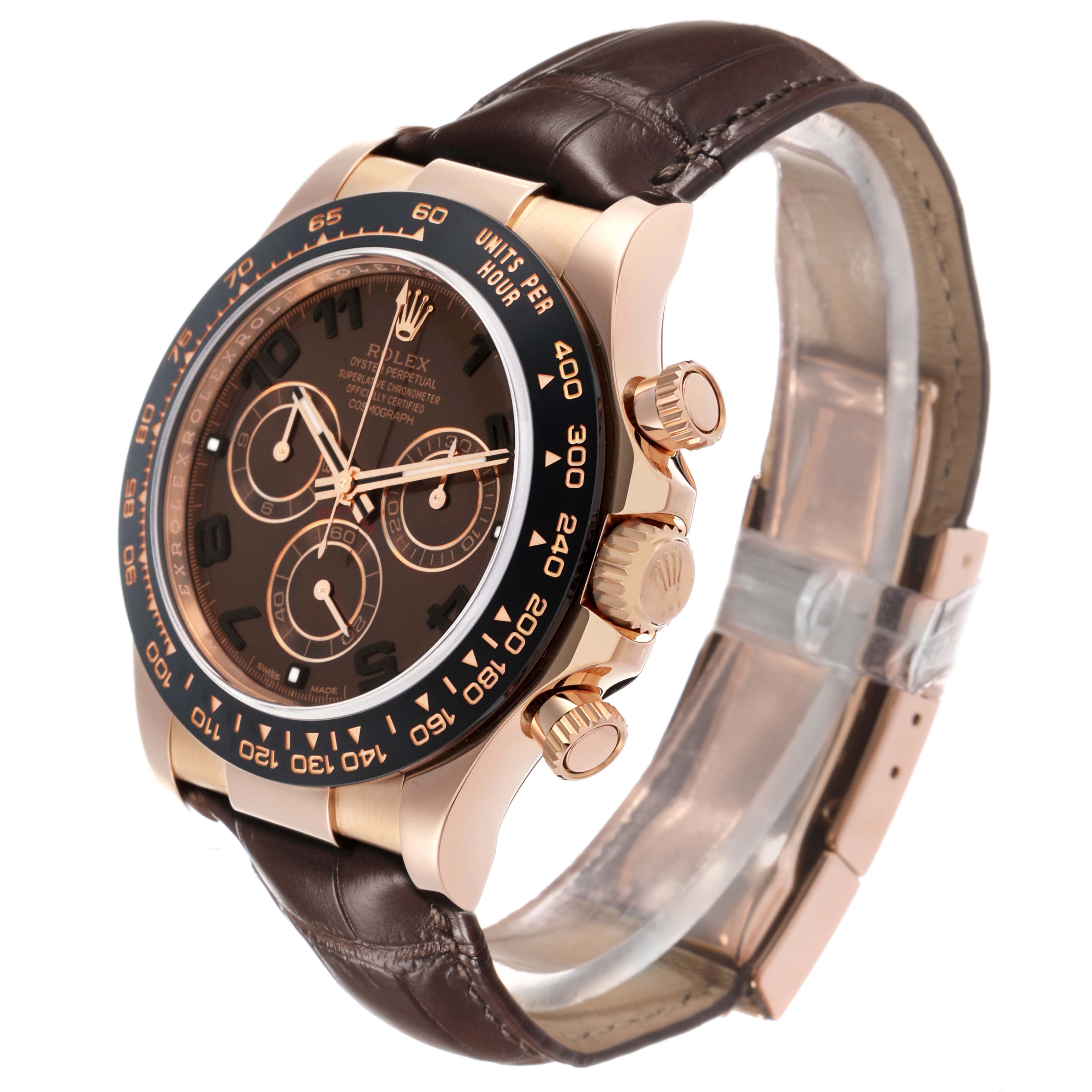 The Rolex Daytona 116515LN Men
s Rose Gold Brown Dial watch is shown at an oblique angle, highlighting the face, bezel, crown, chronograph pushers, and leather strap.
