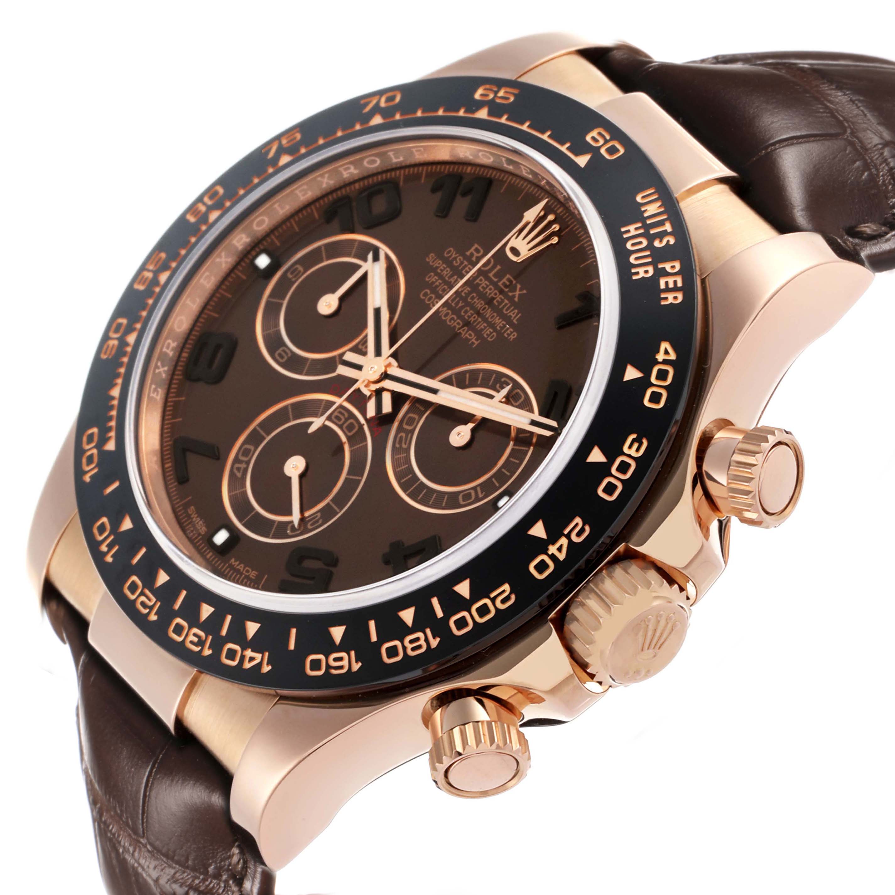 The Rolex Daytona 116515LN Men
s Rose Gold Brown Dial watch is shown in an angled side view, highlighting the case, bezel, crown, pushers, and part of the strap.