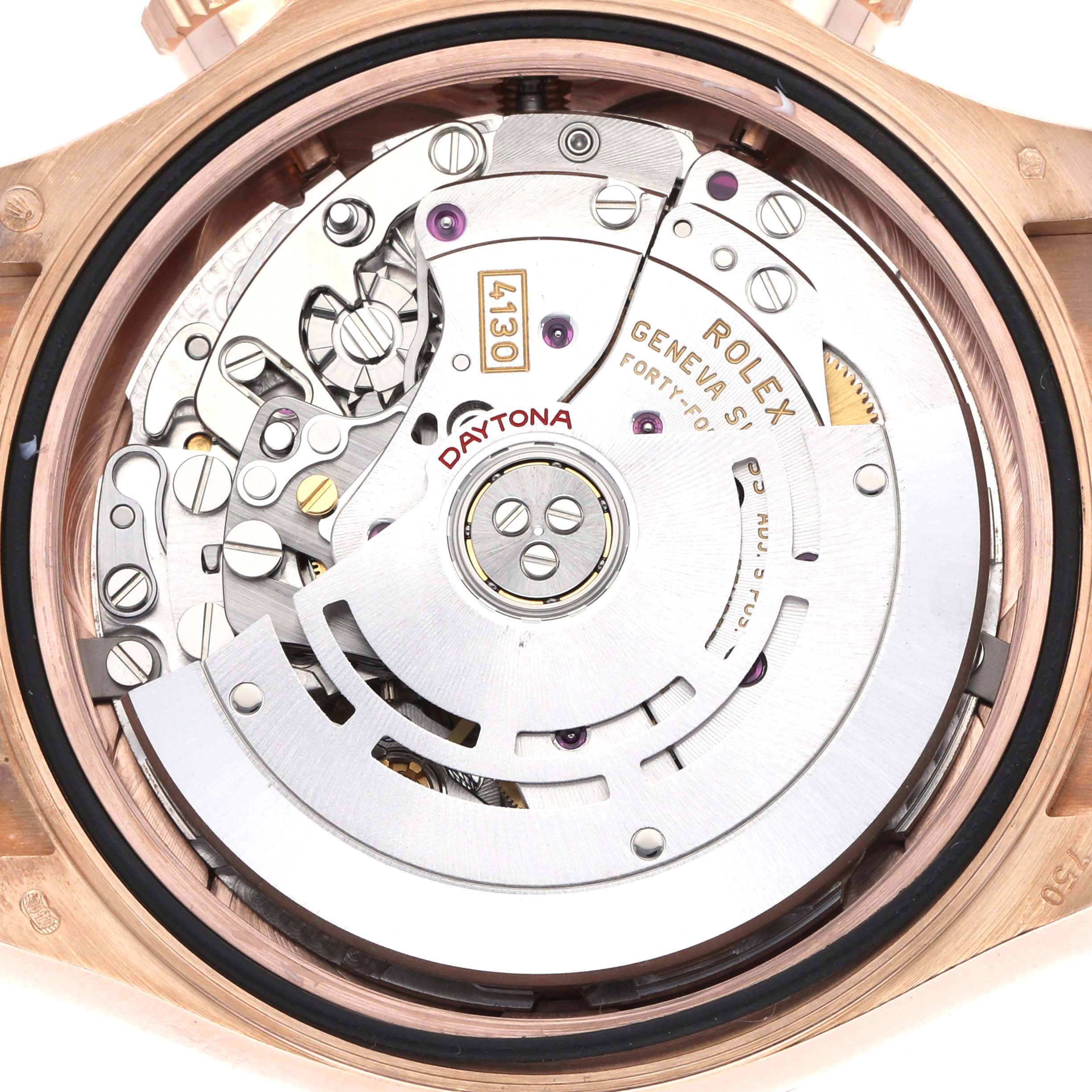 The image shows the movement of a Rolex Daytona 116515LN Men
s Rose Gold Brown Dial watch, viewed from the back, revealing the intricate mechanical components.