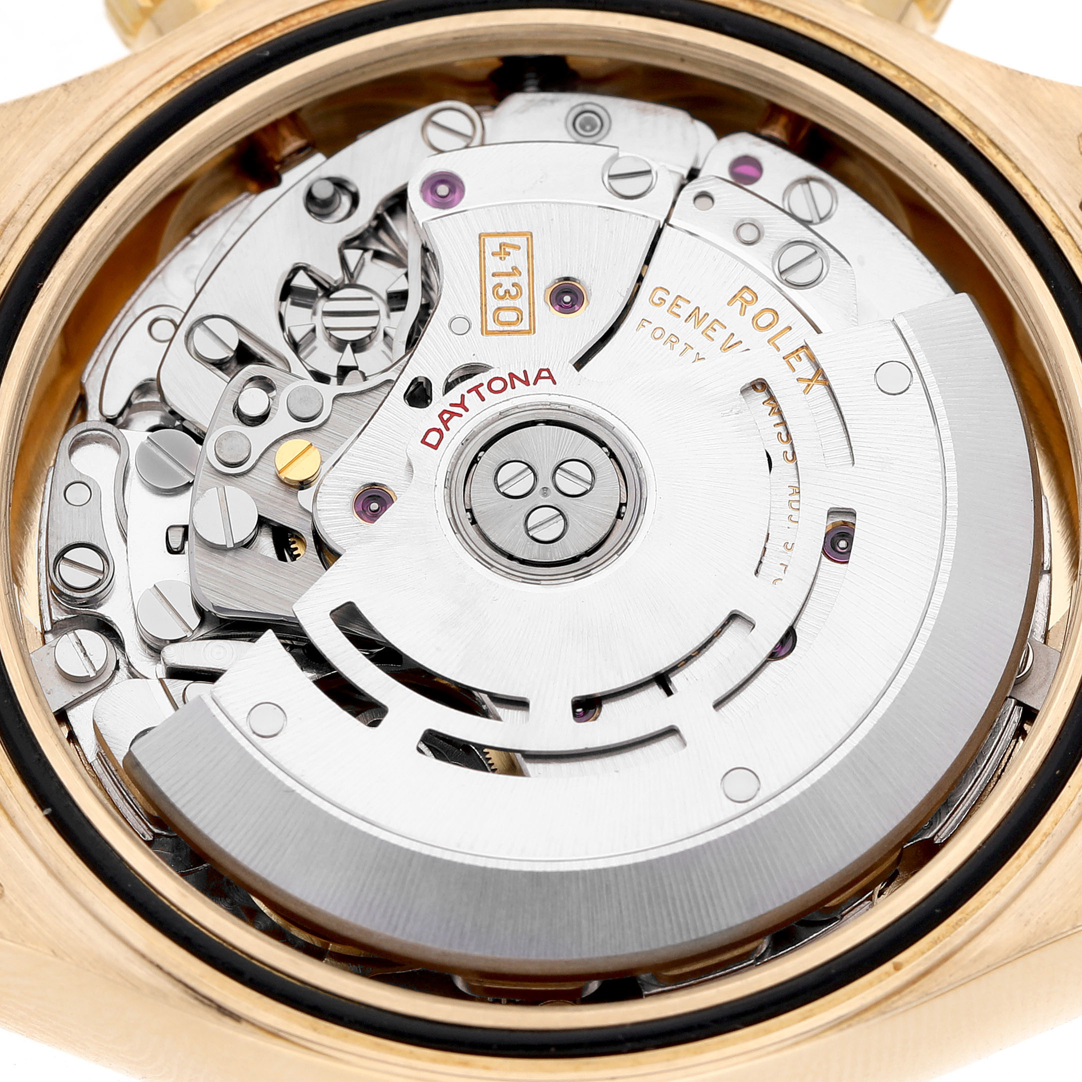 The image shows the movement of a Rolex Daytona 116518 Men's Yellow Gold Mother of Pearl Dial watch from the back, highlighting the intricate mechanics.