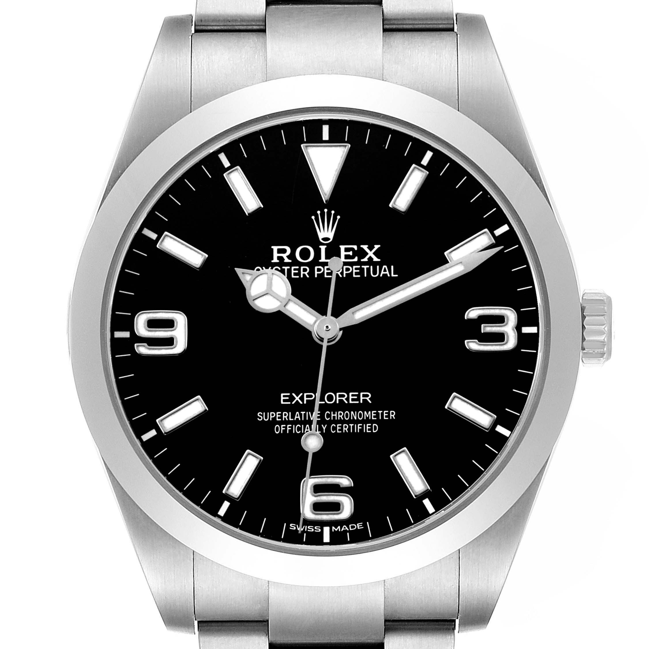 The Rolex Explorer 214270 Men's Stainless Steel Black Dial watch is shown from the front, displaying the dial, hands, hour markers, and part of the bracelet.