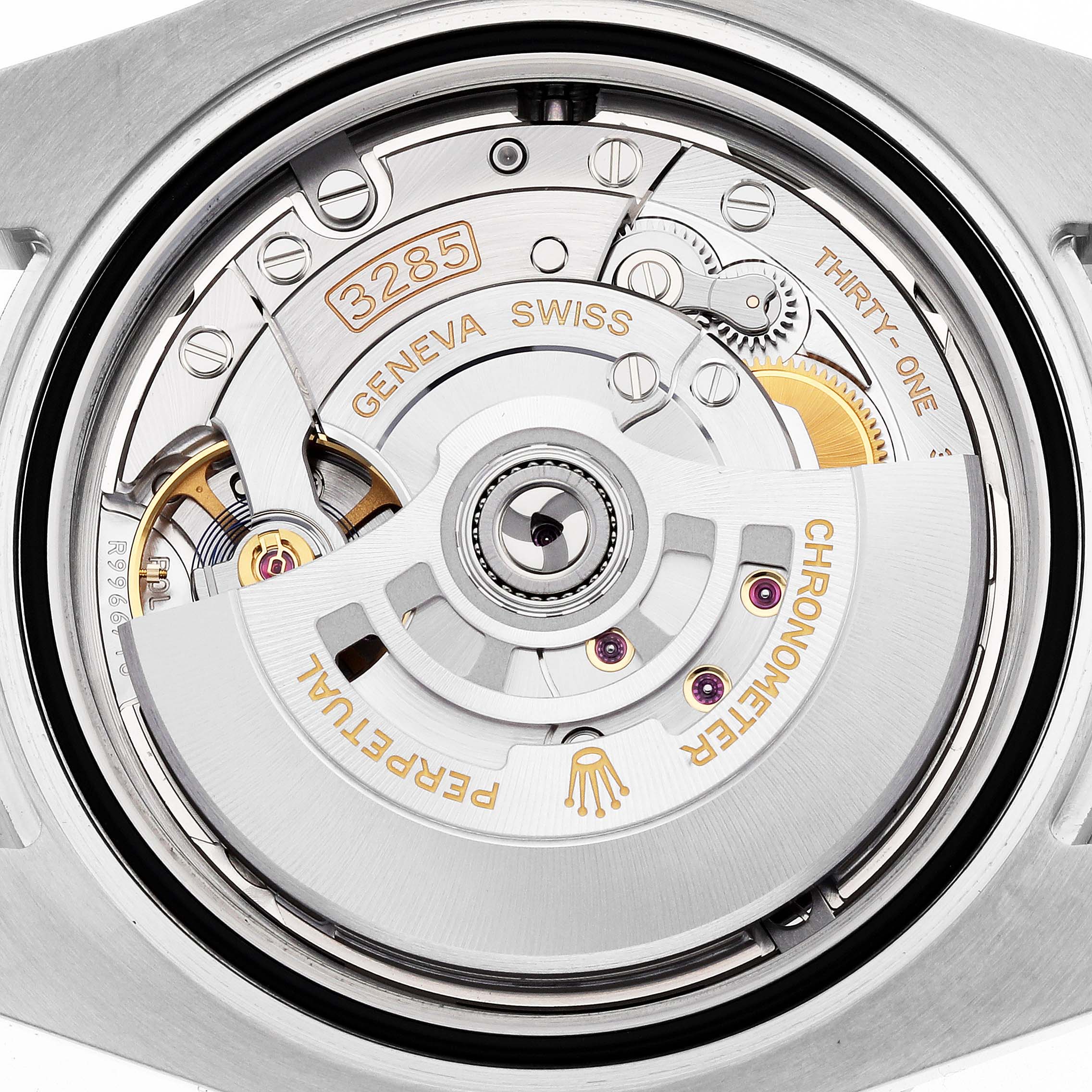 The image shows the movement of a Rolex GMT-Master 126710GRNR Men's Stainless Steel Black Dial, highlighting the rotor and intricate internal components from the back.