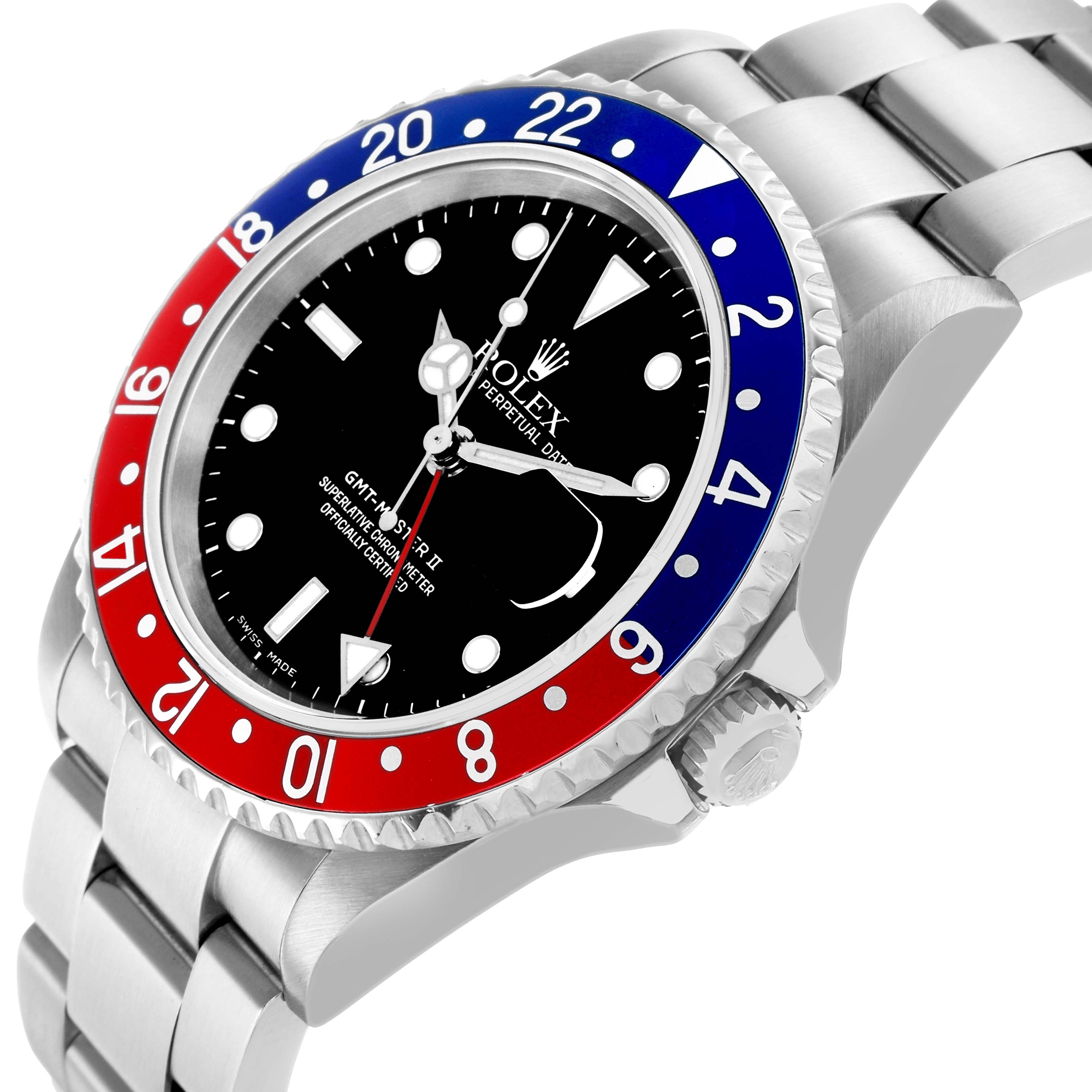 The image shows a Rolex GMT-Master 16710 Men's Stainless Steel Black Dial watch at an angled view, highlighting the bezel, dial, and part of the metal bracelet.
