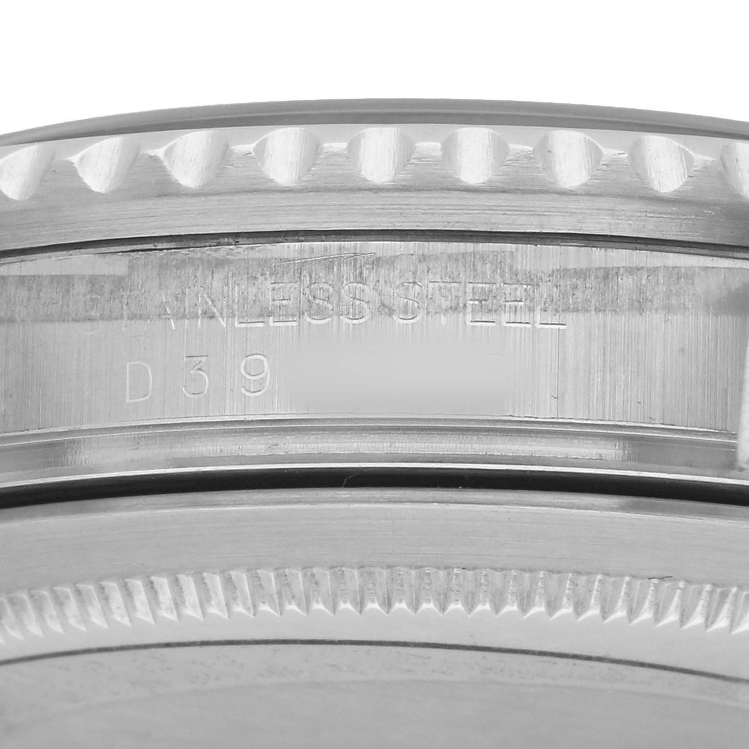 The image shows a close-up of the Rolex GMT-Master 16710 Men's Stainless Steel Black Dial's case side, focusing on the engraved model details and stainless steel material.