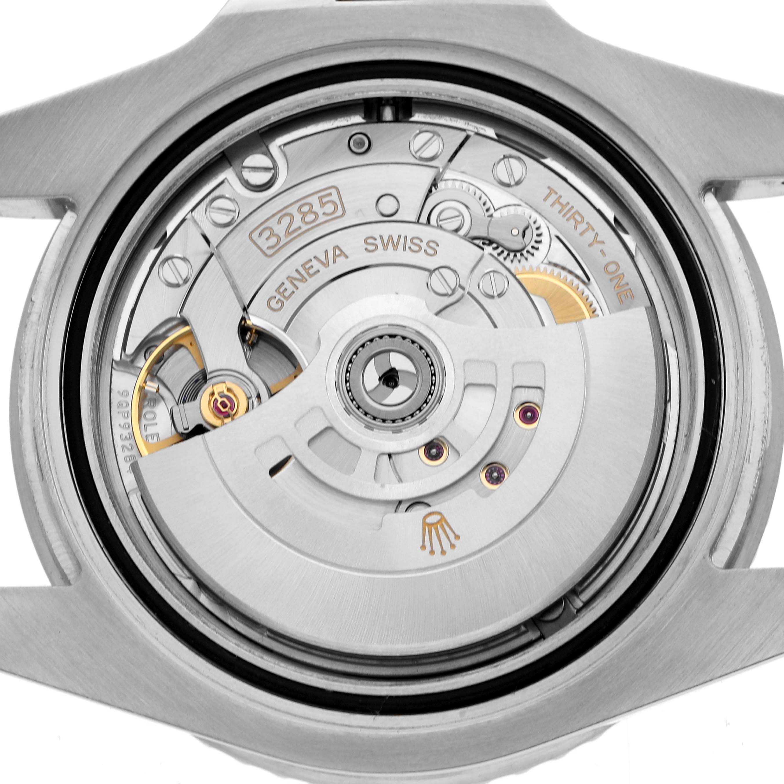 The image shows the back of a Rolex GMT-Master 126710 Men's Stainless Steel Black Dial, highlighting the intricate movement and rotor mechanism.