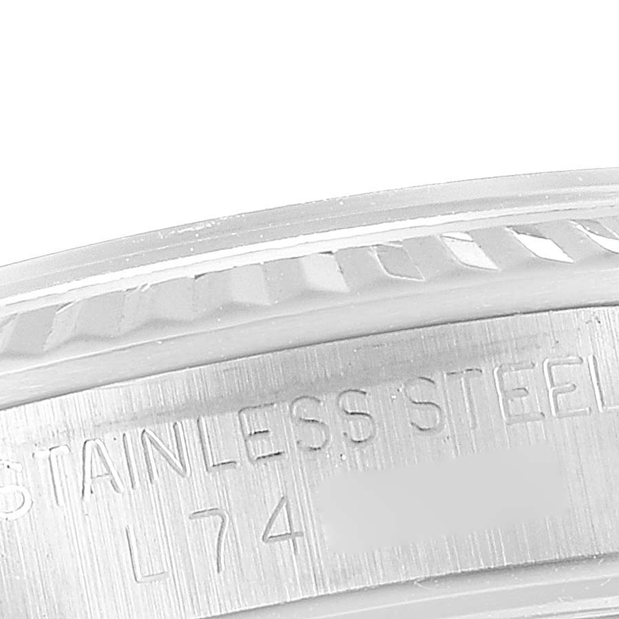 This image shows a close-up angle of the stainless steel side case with engravings for the Mid-Size Rolex watch.