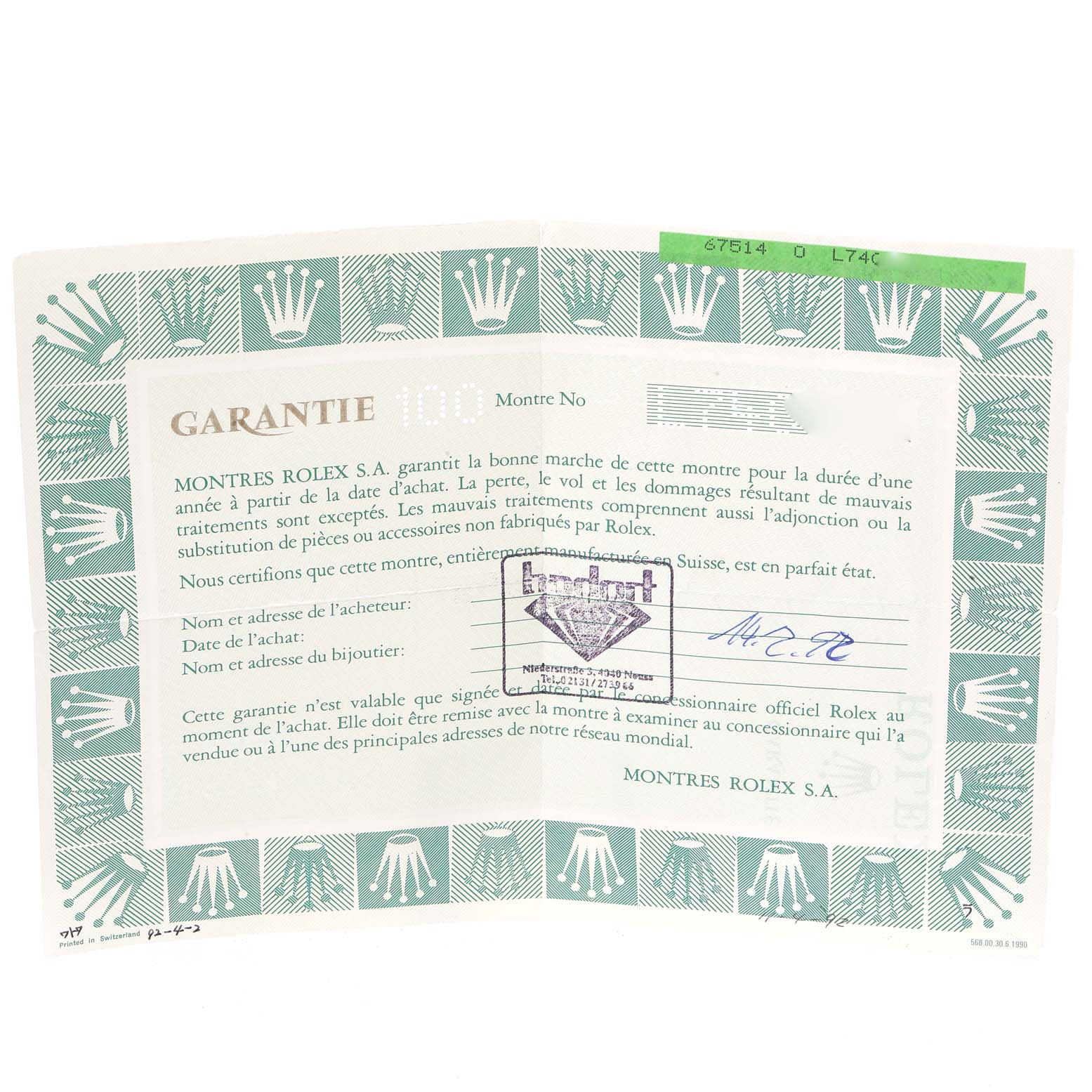 This is a warranty card for the Rolex Mid-Size 67514 Women
s Stainless Steel Blue Dial 67514 Women
s Stainless Steel Blue Dial model, shown from a top-down angle.