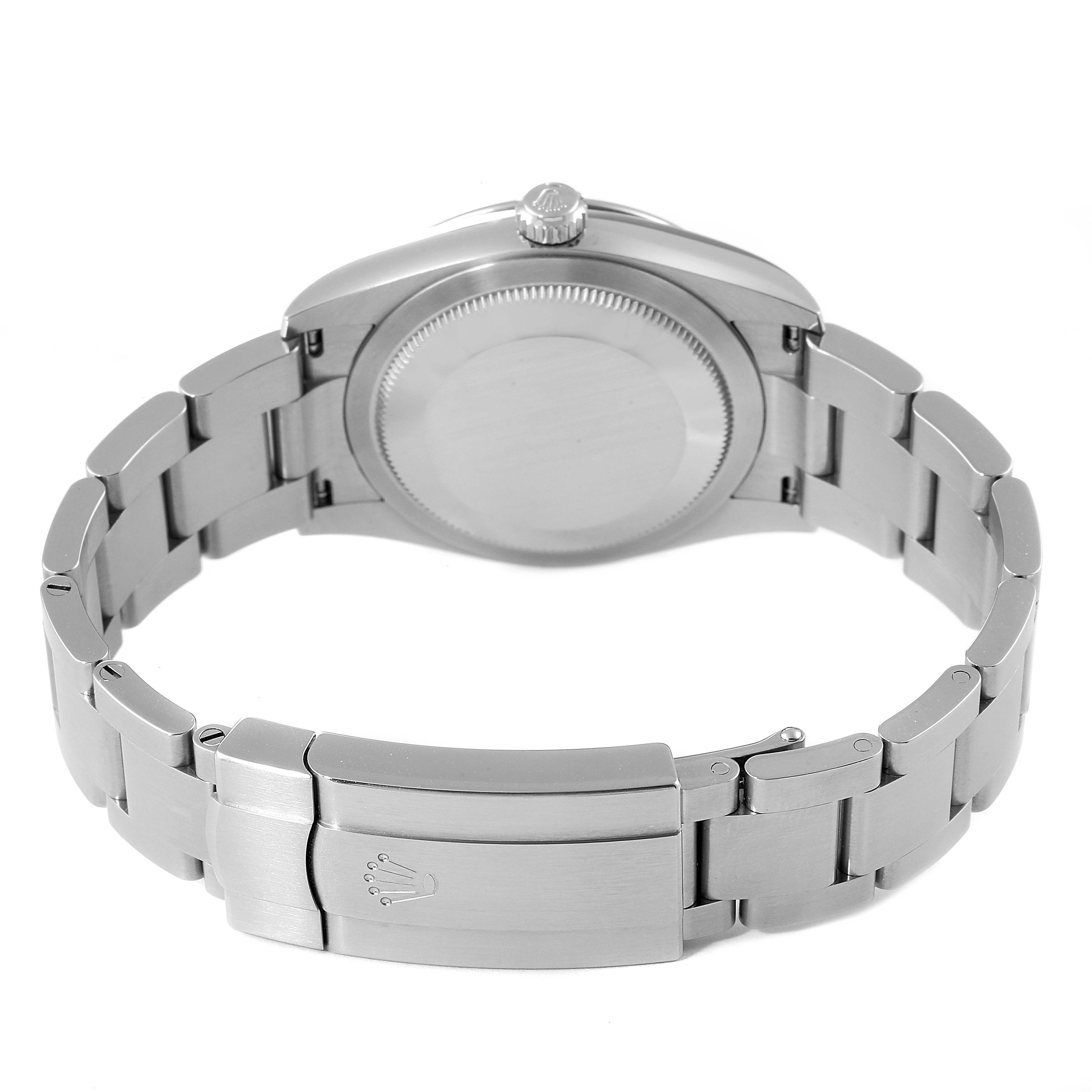 The image shows the back view of a Rolex Oyster Perpetual 124200 Men
s Stainless Steel Black Dial 124200 Men
s Stainless Steel Black Dial watch, focusing on the rear case and metal bracelet with clasp.