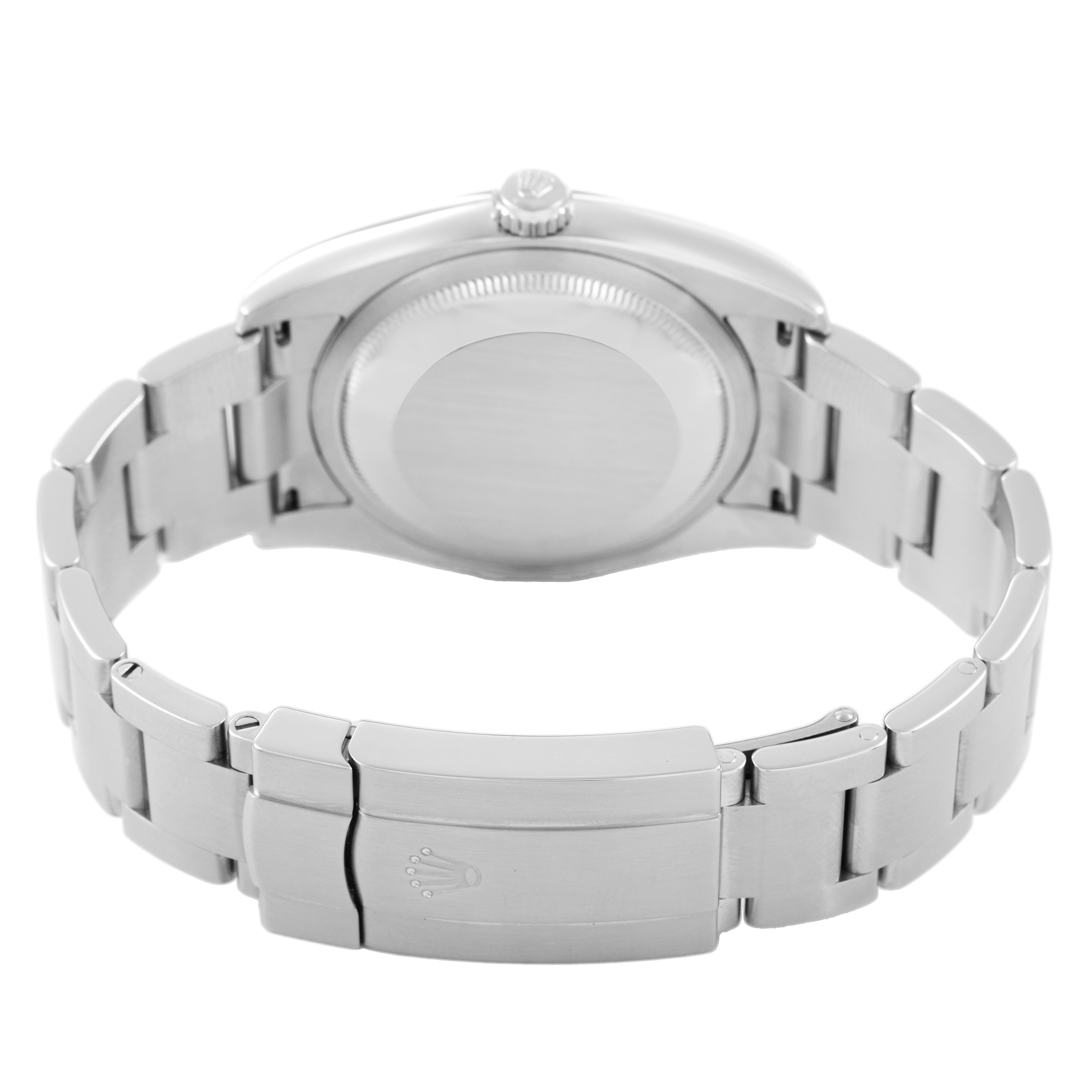 The Rolex Oyster Perpetual 116000 Men's Stainless Steel Black Dial watch is shown from the back, highlighting the case back and bracelet clasp.