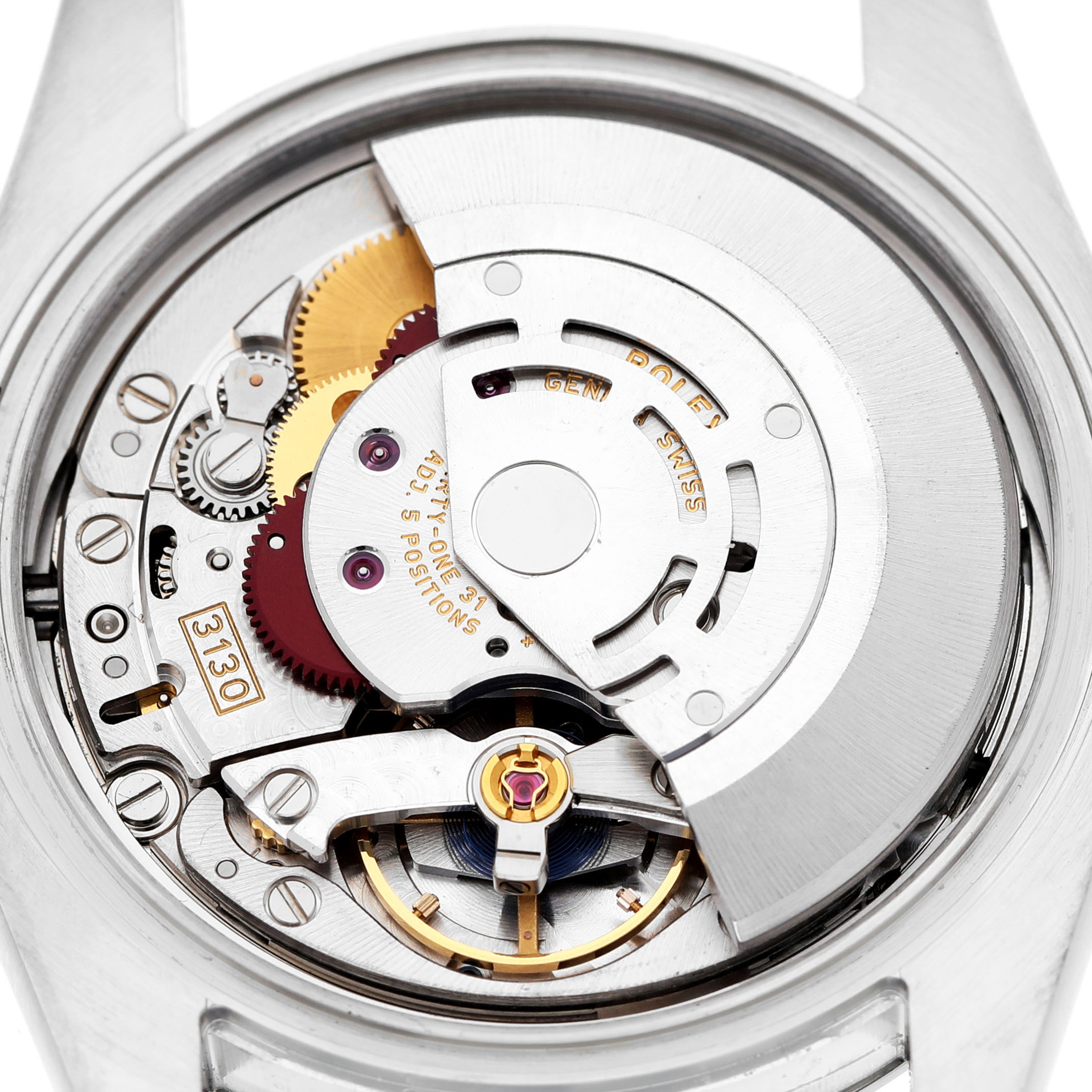 The image shows the internal movement of a Rolex Oyster Perpetual 116000 Men's Stainless Steel Silver Dial watch from a top-down angle, highlighting gears and inscriptions.