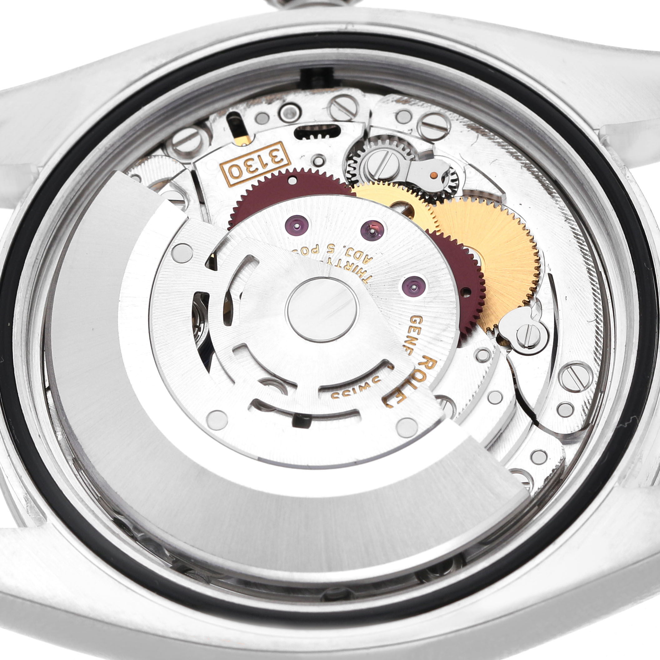 The image shows the movement mechanism of a Rolex Oyster Perpetual 116000 Men's Stainless Steel Silver Dial, viewed from the back.