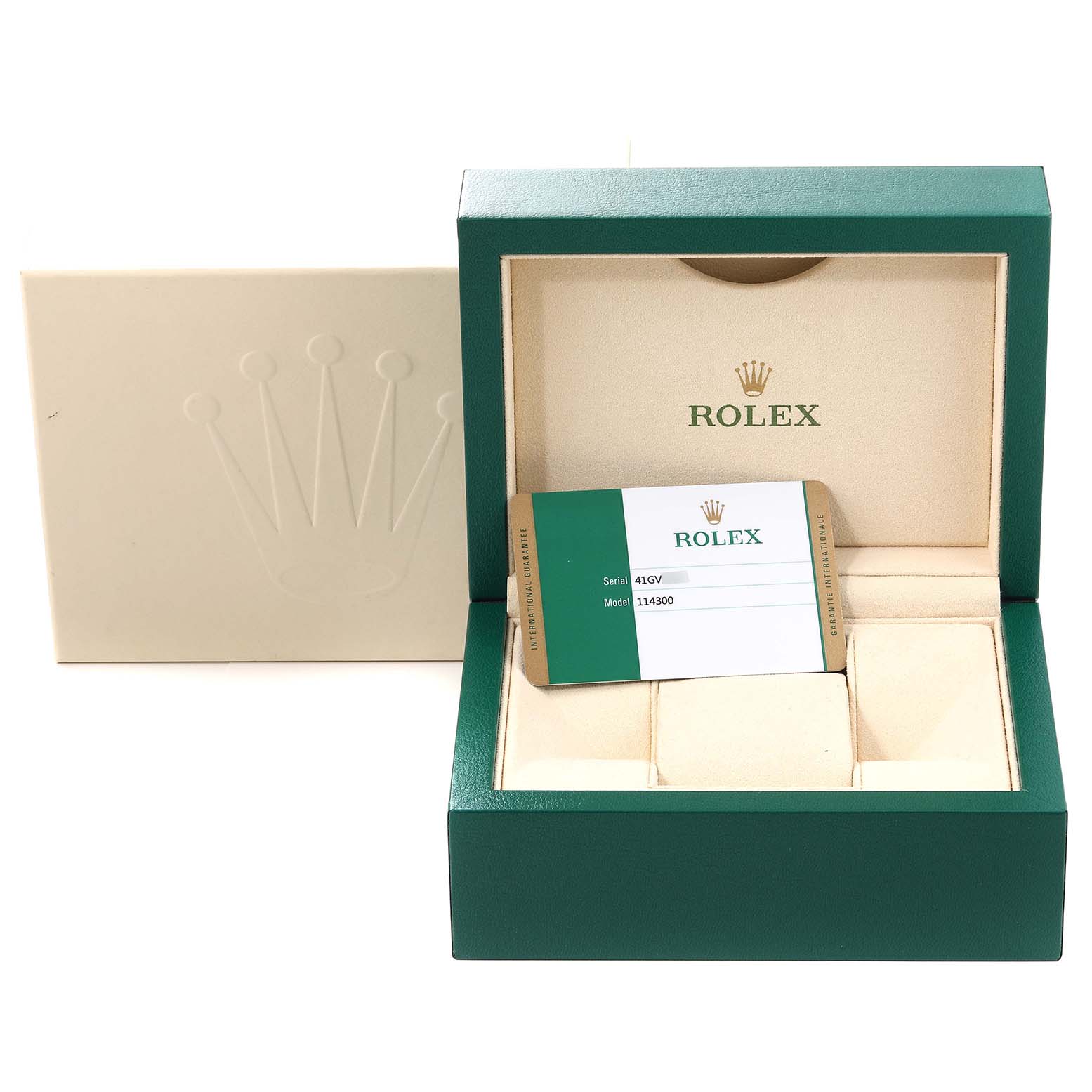This image shows an empty open box for a Rolex Oyster Perpetual 114300 Men's Stainless Steel Grey Dial 114300 Men's Stainless Steel Grey Dial model with a warranty card displayed inside.
