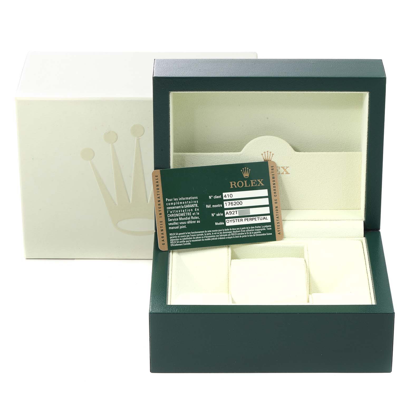 The image shows the packaging, box, and warranty card for a Rolex Oyster Perpetual 176200 Women
s Stainless Steel Silver Dial 176200 Women
s Stainless Steel Silver Dial watch, viewed from the front.