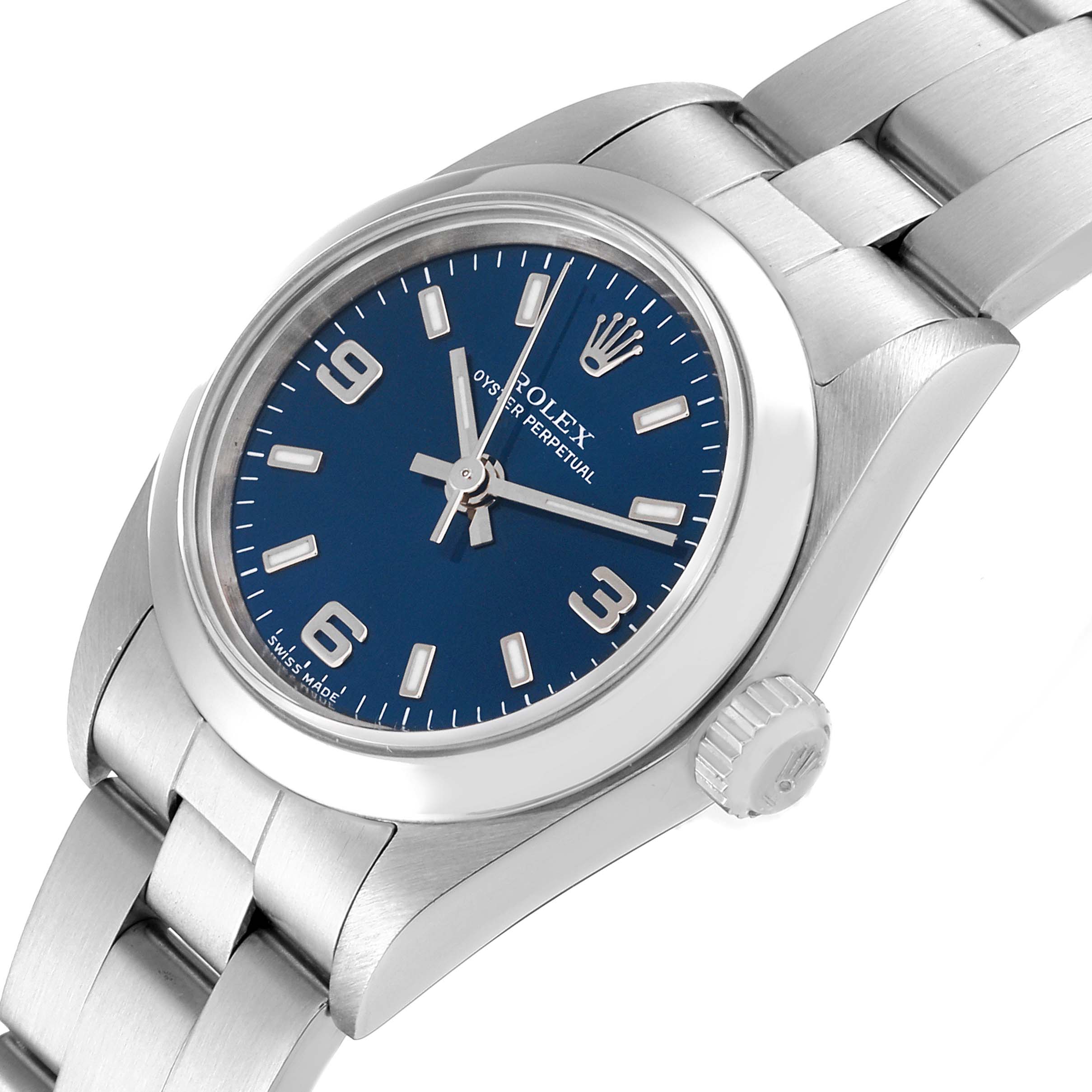 The image shows a Rolex Oyster Perpetual 76080 Women
s Stainless Steel Blue Dial 76080 Women
s Stainless Steel Blue Dial watch at an angled view displaying the face, bezel, crown, and part of the bracelet.