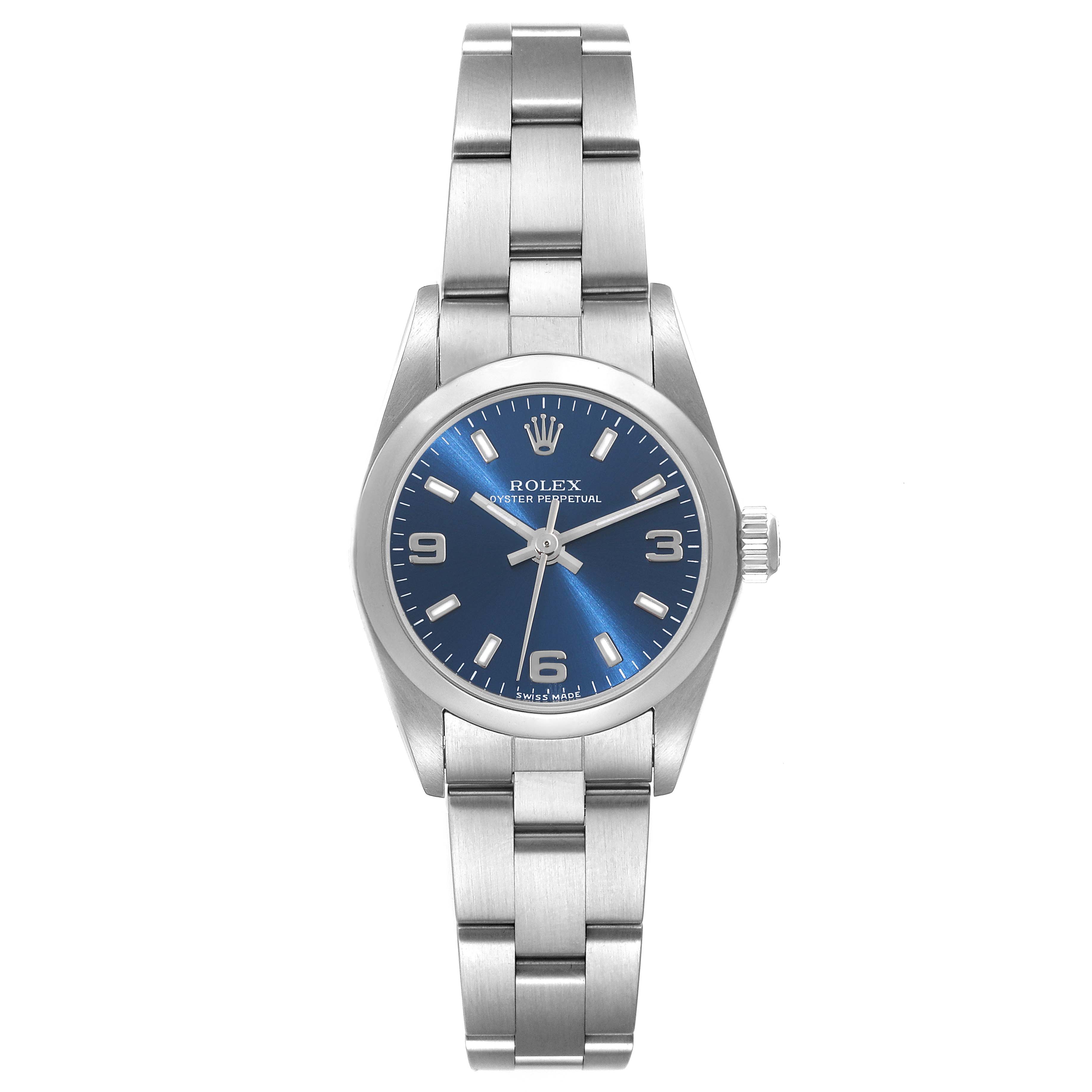 The image shows a Rolex Oyster Perpetual 76080 Women
s Stainless Steel Blue Dial 76080 Women
s Stainless Steel Blue Dial watch, featuring a blue dial, stainless steel case, and bracelet, from a top-down perspective.