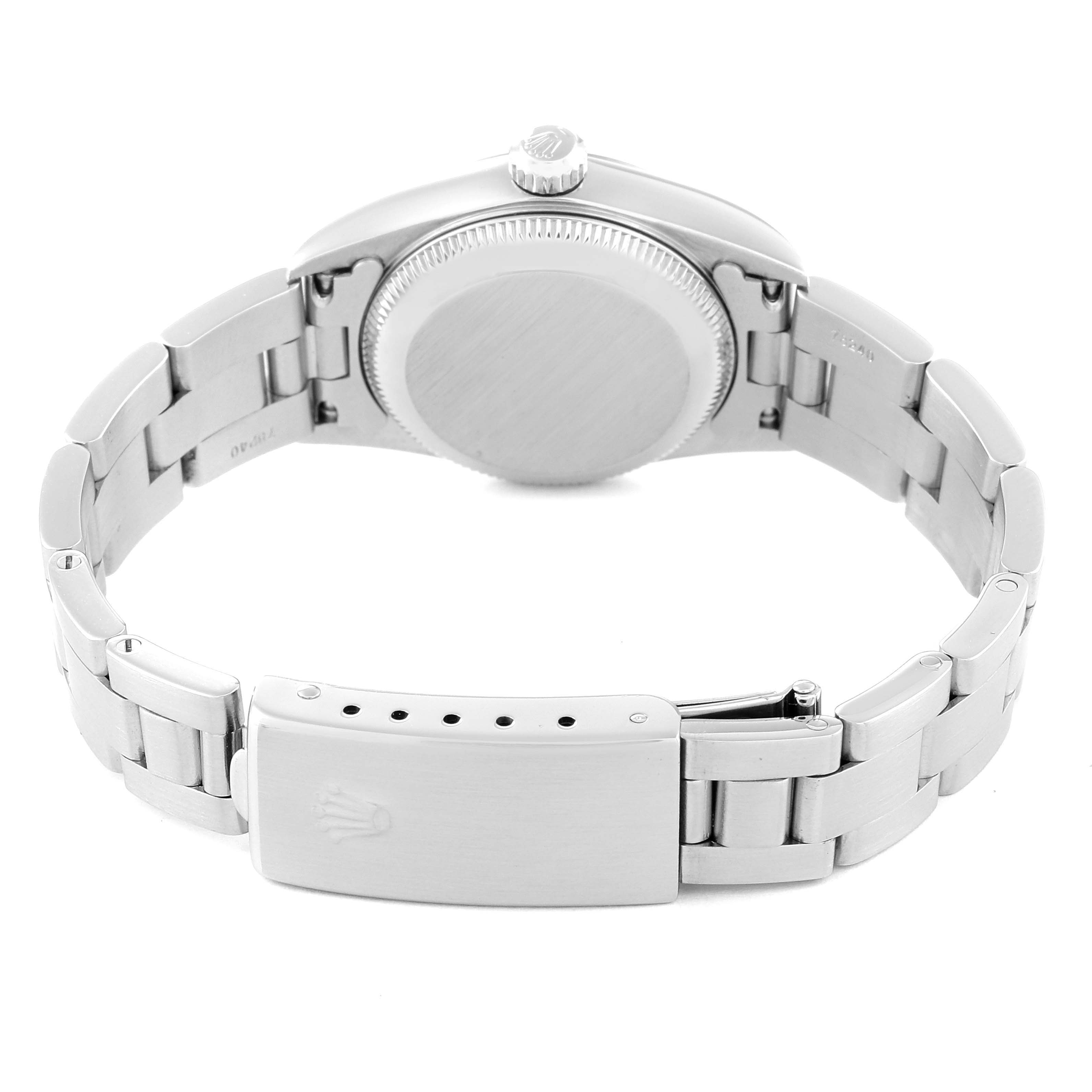 The image shows the back view of a Rolex Oyster Perpetual 76080 Women
s Stainless Steel Blue Dial 76080 Women
s Stainless Steel Blue Dial watch, highlighting the watch case and bracelet with a clasp.