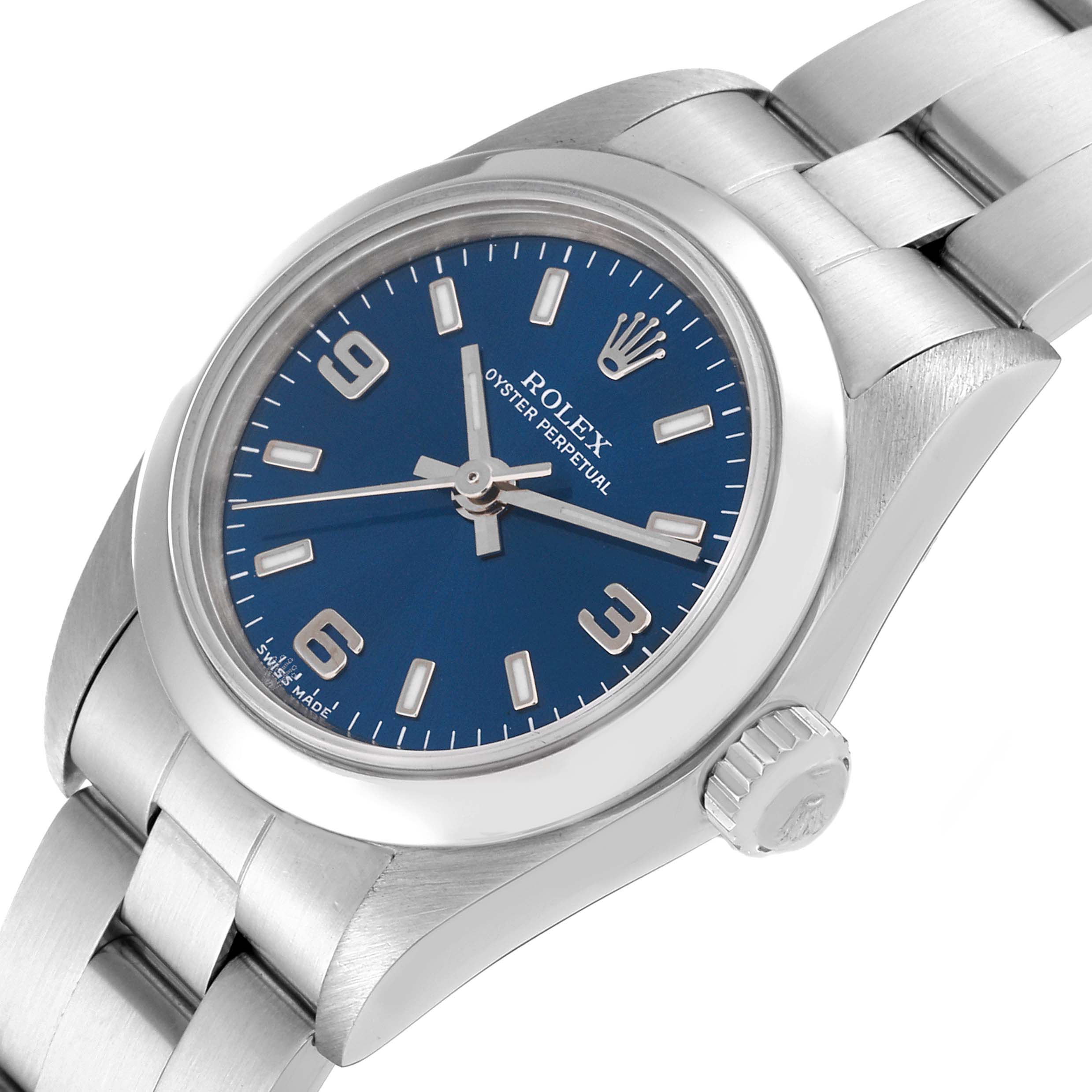 This image shows a Rolex Oyster Perpetual 76080 Women
s Stainless Steel Blue Dial 76080 Women
s Stainless Steel Blue Dial watch at an angle displaying the face, crown, and part of the bracelet.