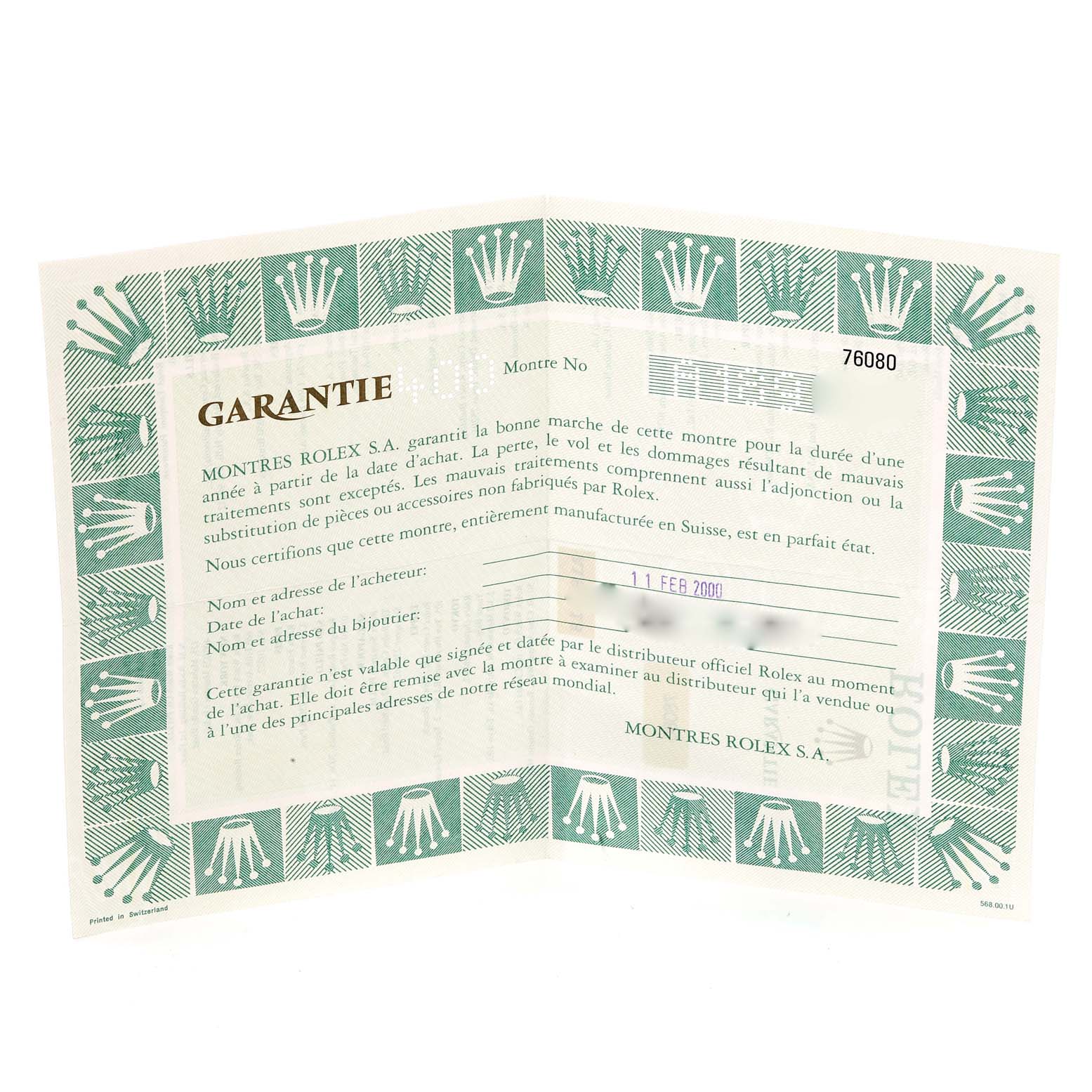 This image shows the warranty certificate for a Rolex Oyster Perpetual 76080 Women's Stainless Steel Pink Dial 76080 Women's Stainless Steel Pink Dial watch at an angled view.