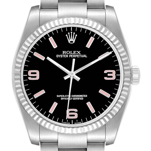 The Rolex Oyster Perpetual 116034 Men's Stainless Steel Black Dial watch is shown front-on, displaying its black dial, fluted bezel, crown, and partial bracelet.