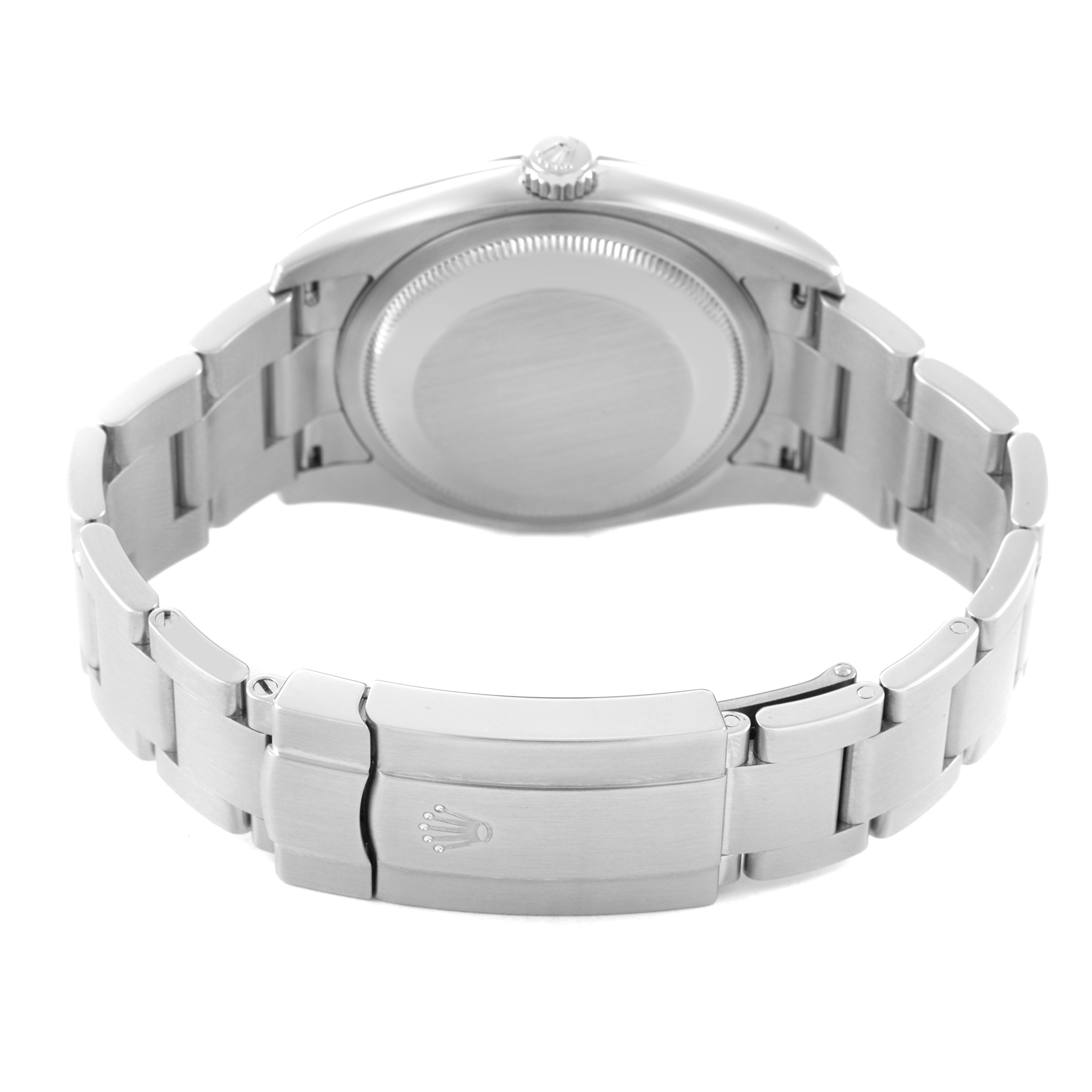 The image shows the back view of a Rolex Oyster Perpetual 116034 Men's Stainless Steel Silver Dial, highlighting the case back, bracelet, and clasp.