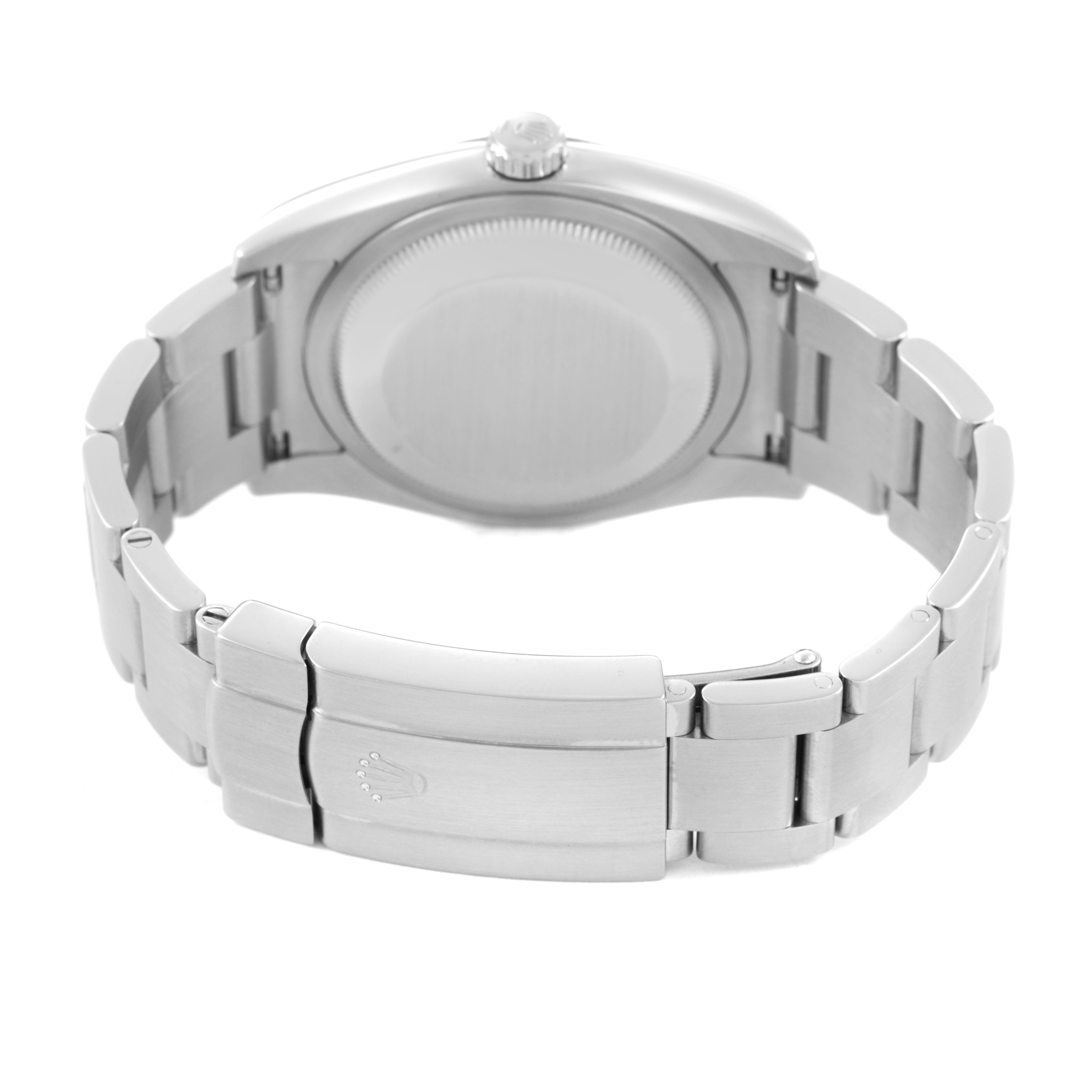 The image shows the back view of a Rolex Oyster Perpetual 116034 Men's Stainless Steel Silver Dial watch, highlighting its clasp and bracelet links.