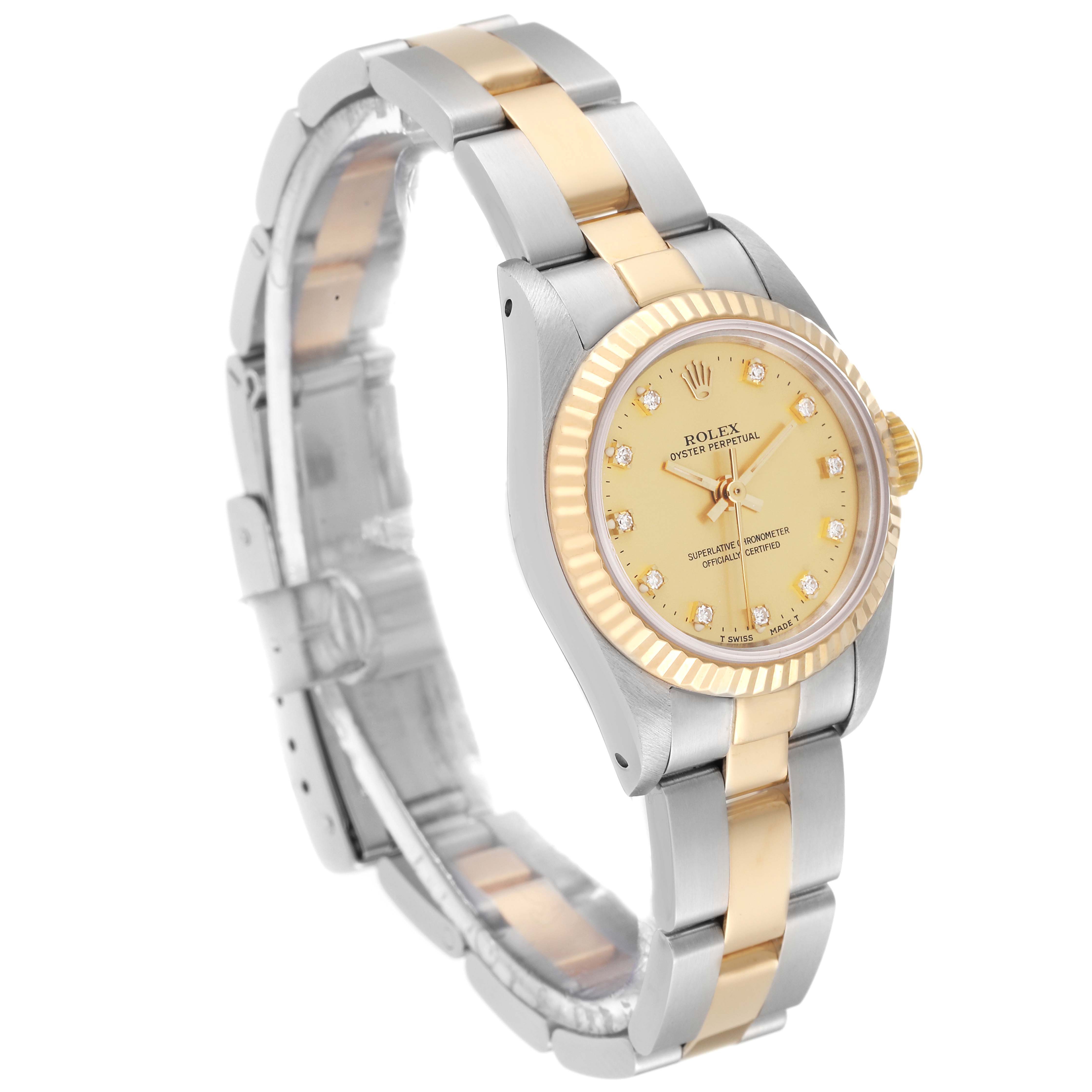 This image shows a Rolex Oyster Perpetual 67193 Women's Steel and Gold (two tone) Champagne Dial 67193 Women's Steel and Gold (two tone) Champagne Dial watch at a three-quarter angle, displaying the face, bezel, and bracelet.