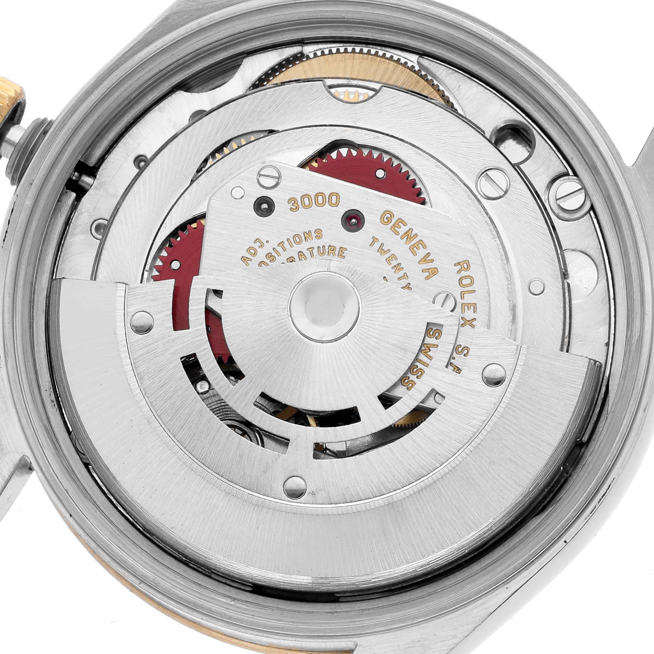 The image shows the internal movement and rotor of a Rolex Oyster Perpetual 14203 Men
s Steel and Gold (two tone) Silver Dial watch from a rear angle.