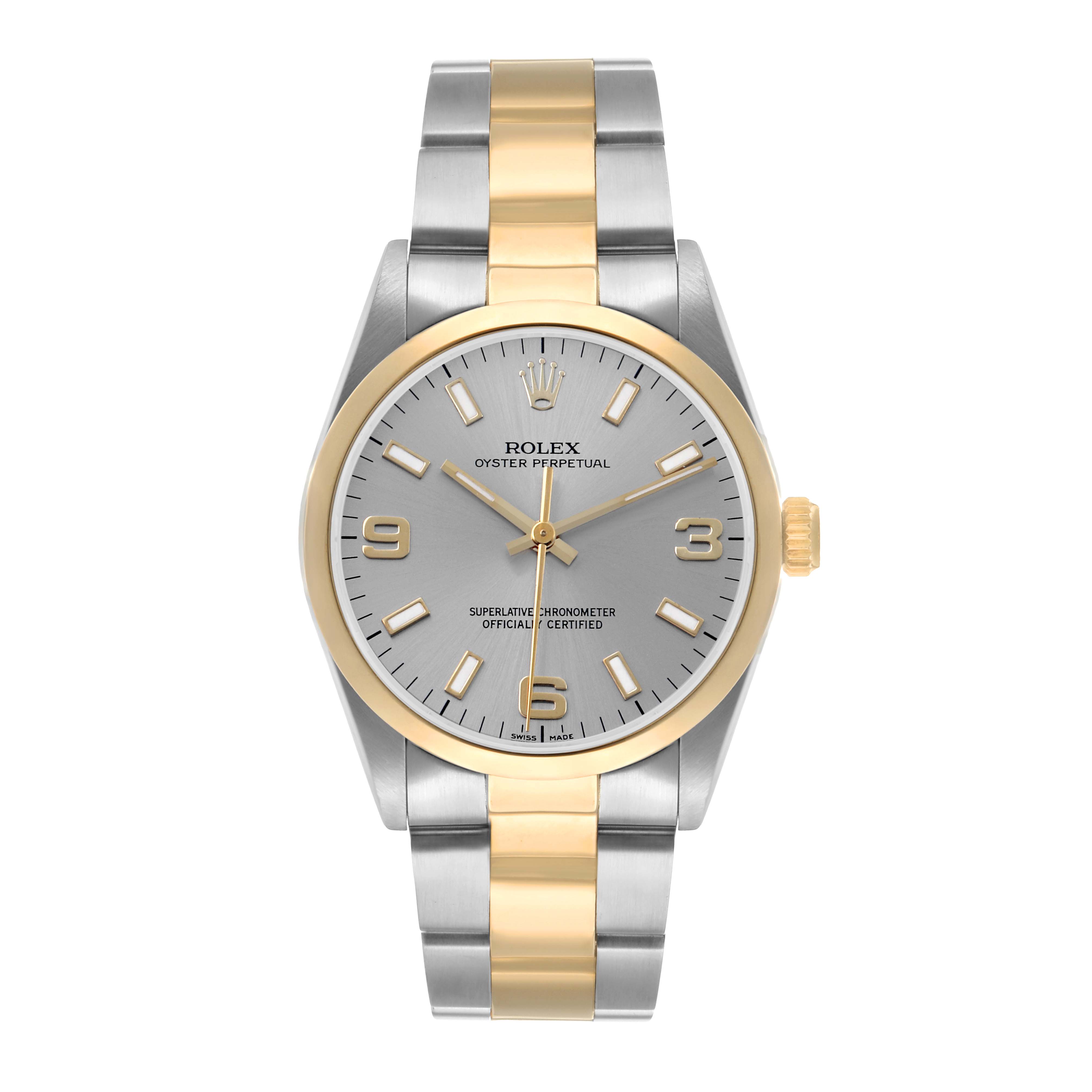 The Rolex Oyster Perpetual 14203 Men
s Steel and Gold (two tone) Silver Dial watch is shown from the front, highlighting its two-tone bracelet and gold bezel.
