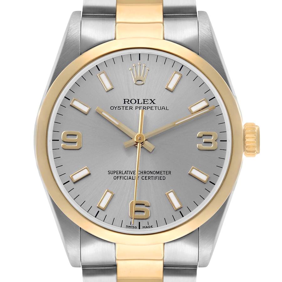 The Rolex Oyster Perpetual 14203 Men
s Steel and Gold (two tone) Silver Dial watch is shown from a front angle, displaying the face, crown, and part of the bracelet.