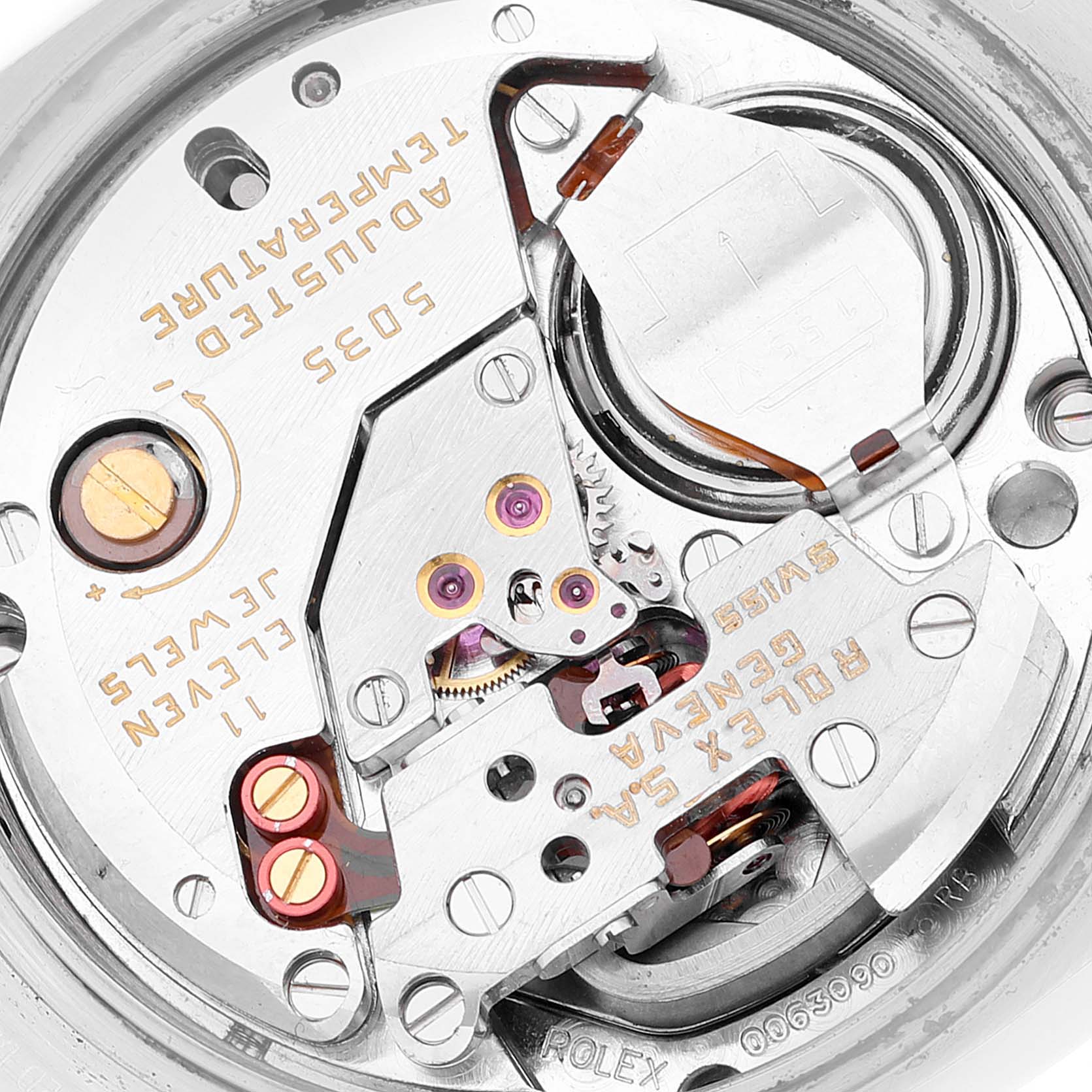 The image shows the internal movement of a Rolex Oysterquartz 17000 Men
s Stainless Steel Silver Dial 17000 Men
s Stainless Steel Silver Dial model from a top-down angle, highlighting gears and jewels.