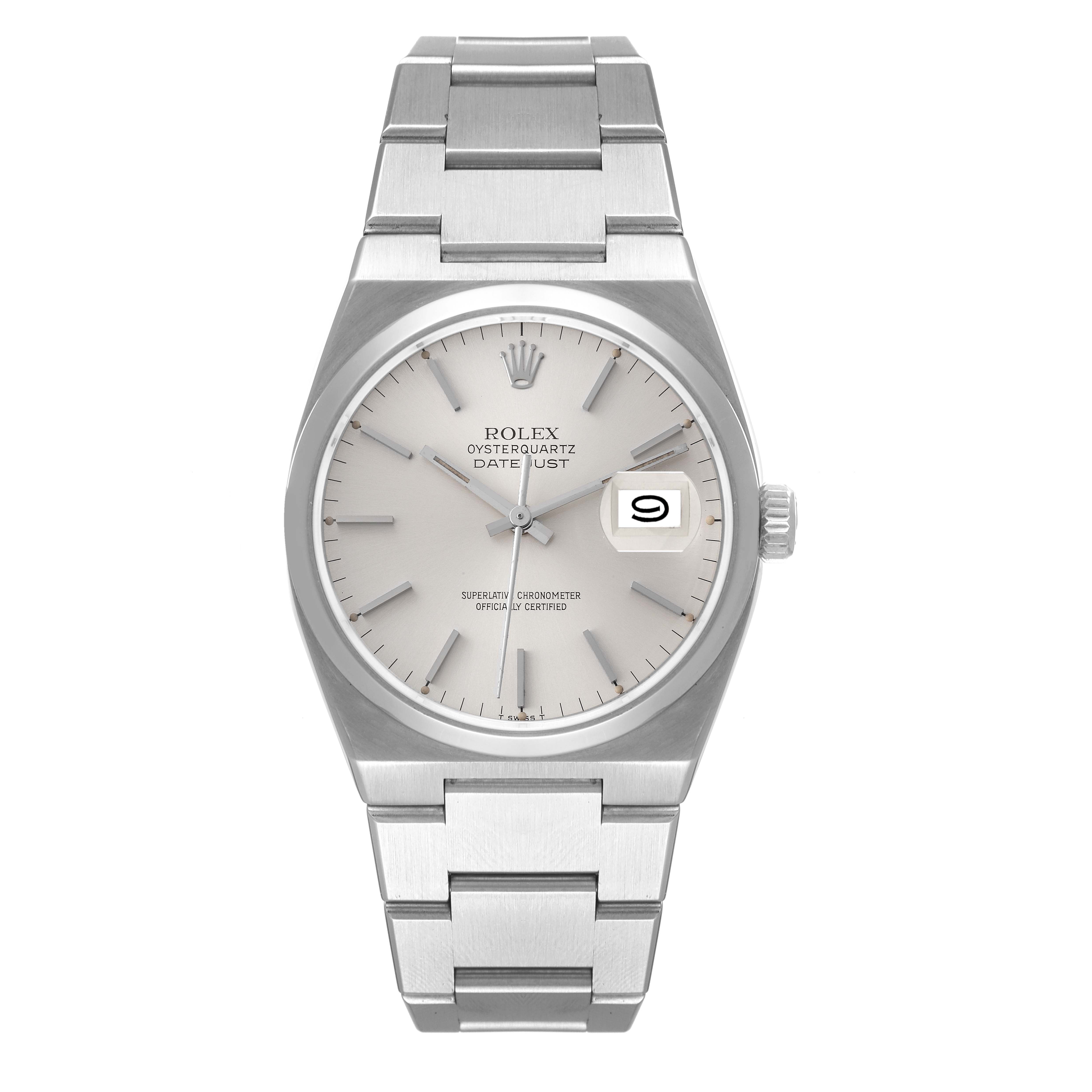 The Rolex Oysterquartz 17000 Men
s Stainless Steel Silver Dial 17000 Men
s Stainless Steel Silver Dial watch is shown from a top-down angle, displaying its dial, bracelet, and date window.