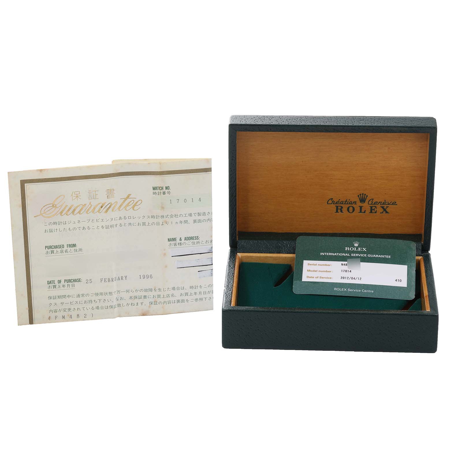 The image shows the accessories of a Rolex Oysterquartz 17014 Men's Stainless Steel Silver Dial 17014 Men's Stainless Steel Silver Dial watch, including its guarantee card, service card, and original box.