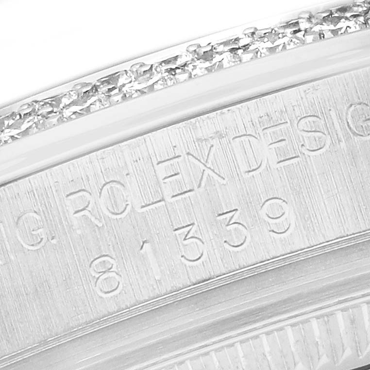The image shows a close-up of the engraved side of a Rolex Pearlmaster 81339 Women's White Gold Silver Dial, highlighting its model number and bezel detailing.
