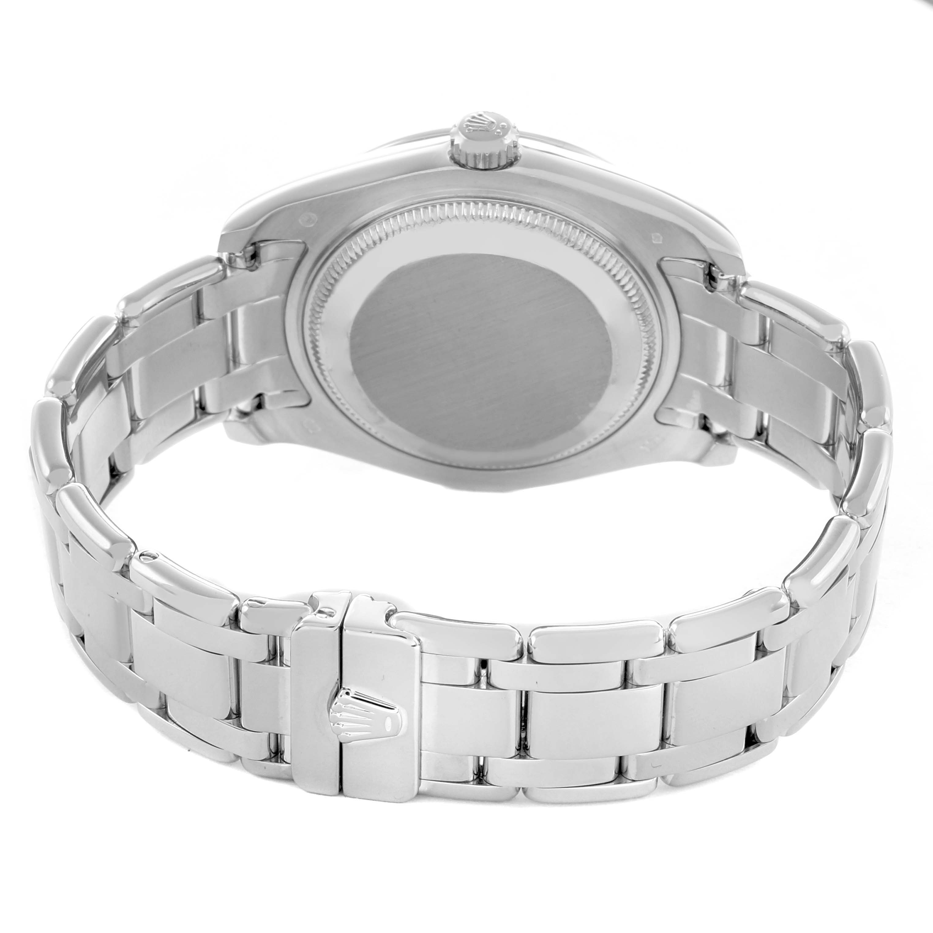 The Rolex Pearlmaster 81339 Women's White Gold Silver Dial watch is shown from the back, highlighting the case back, crown, and bracelet with its clasp.