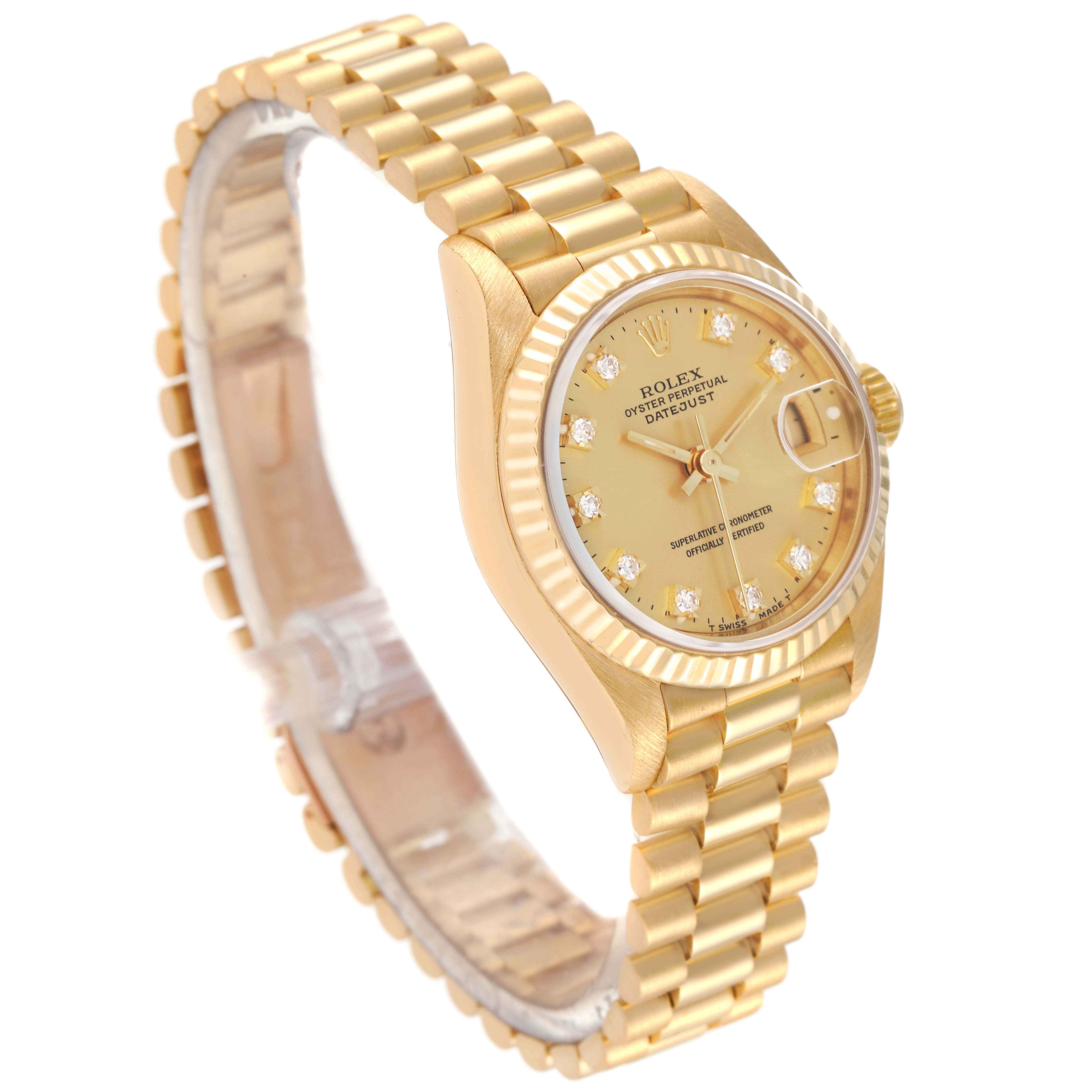 The image shows a Rolex President 69178 Women
s Yellow Gold Champagne Dial 69178 Women
s Yellow Gold Champagne Dial model watch at an oblique angle, highlighting its gold-colored bracelet, dial, and fluted bezel.
