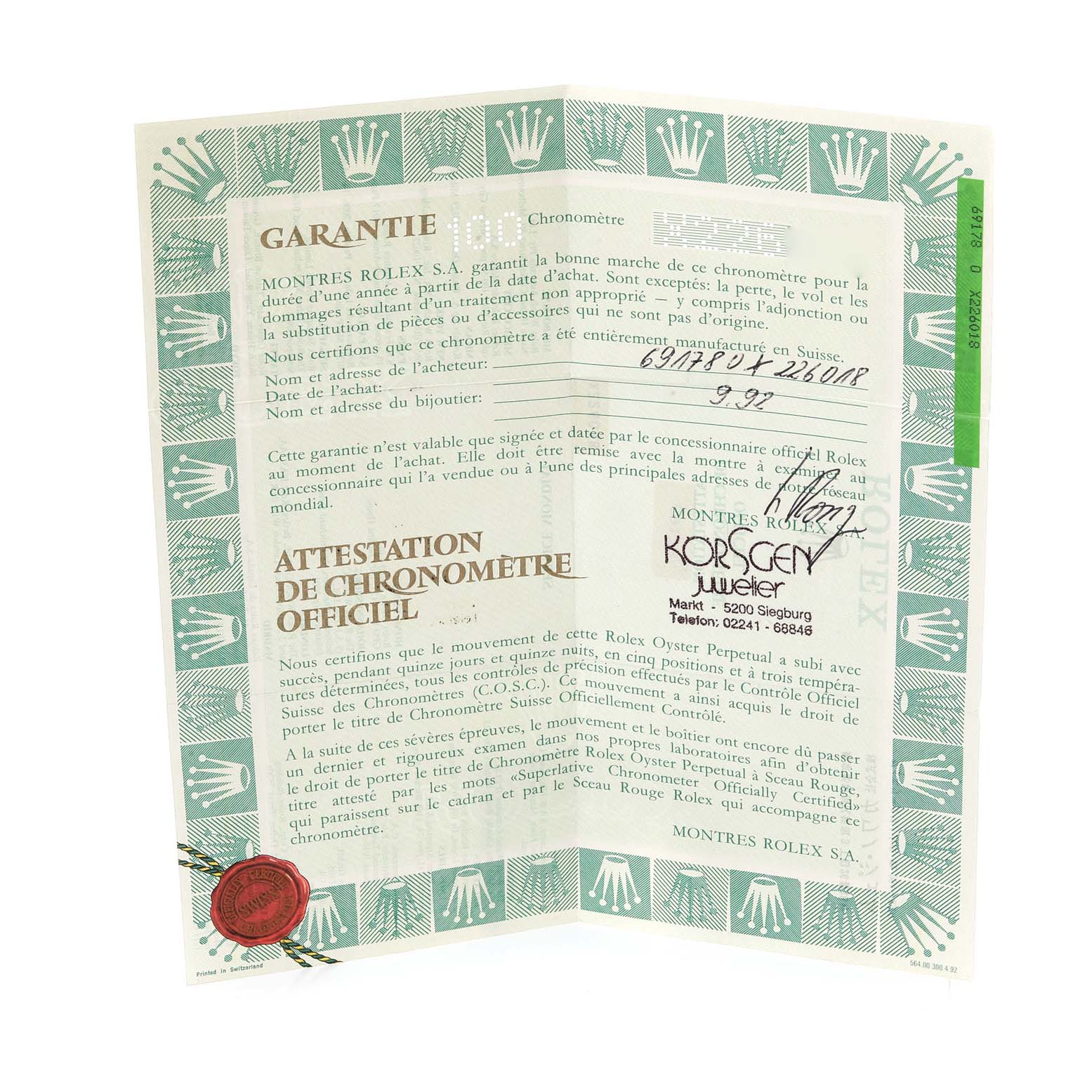 The image displays a Rolex President 69178 Women
s Yellow Gold Champagne Dial 69178 Women
s Yellow Gold Champagne Dial model watch warranty certificate, shown open and clearly showing the text and official seals.