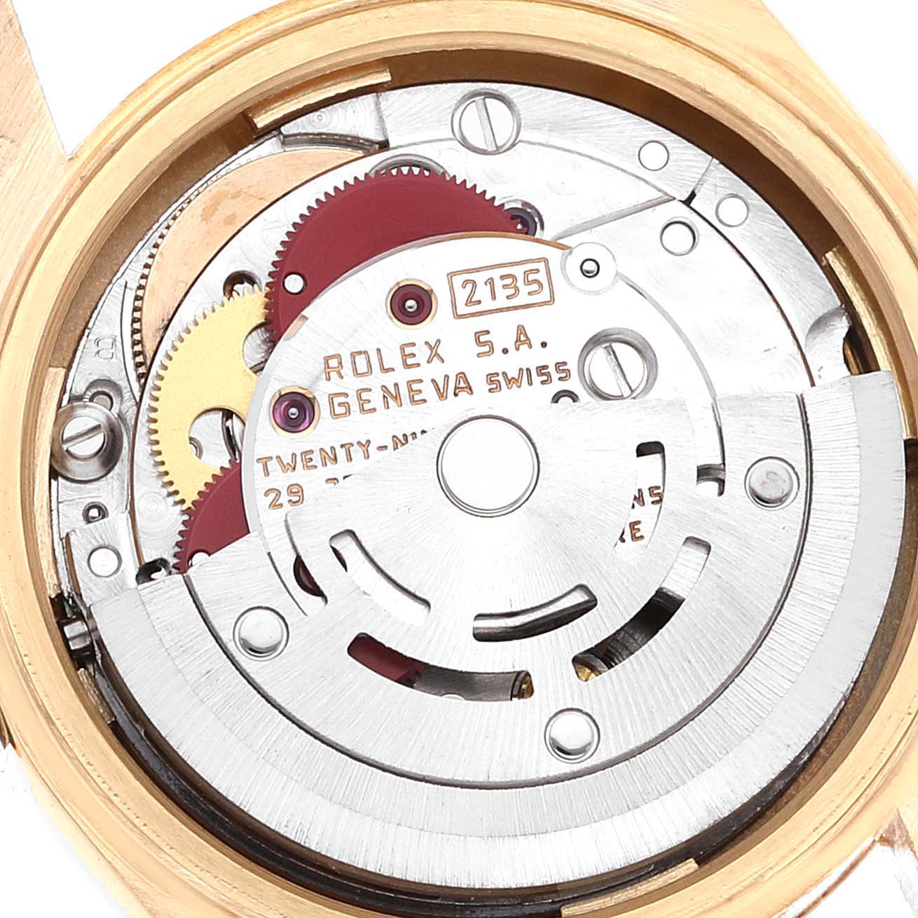 This is an internal view of a Rolex President 69178 Women
s Yellow Gold Champagne Dial 69178 Women
s Yellow Gold Champagne Dial model showing the intricate mechanics and parts of the watch movement.