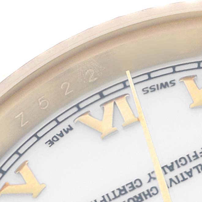 The image shows a close-up of the Rolex President 179178 Women's Yellow Gold White Dial watch's dial with Roman numeral markers and part of the bezel.
