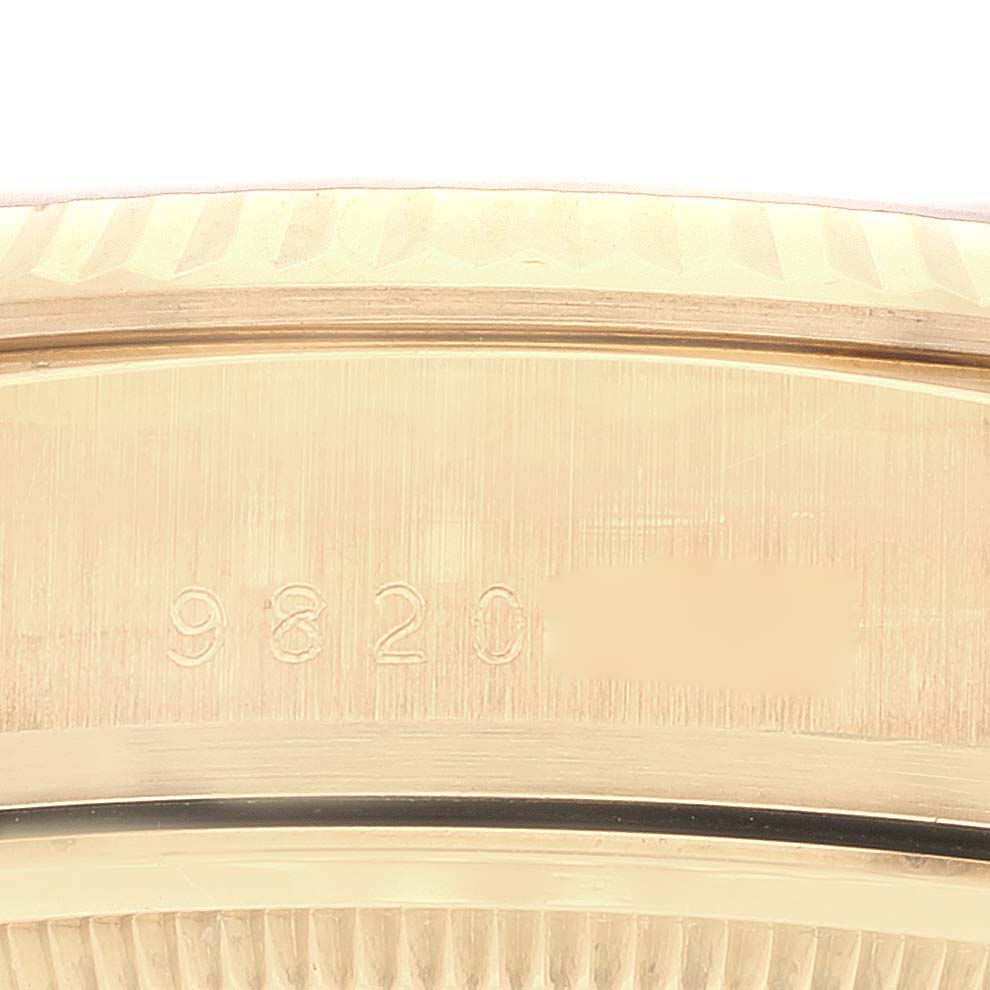 The image shows a close-up of the serial number engraved on the side of a Rolex President 18038 Men
s Yellow Gold Champagne Dial 18038 Men
s Yellow Gold Champagne Dial model watch.